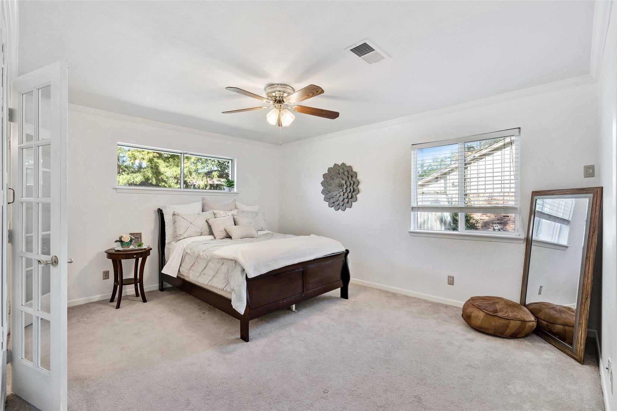 Serene primary suite has fresh nuetral paint and large double paned windows! What a great place to relax after a long day!*Home was previously furnished. There is currently no furniture in the home.