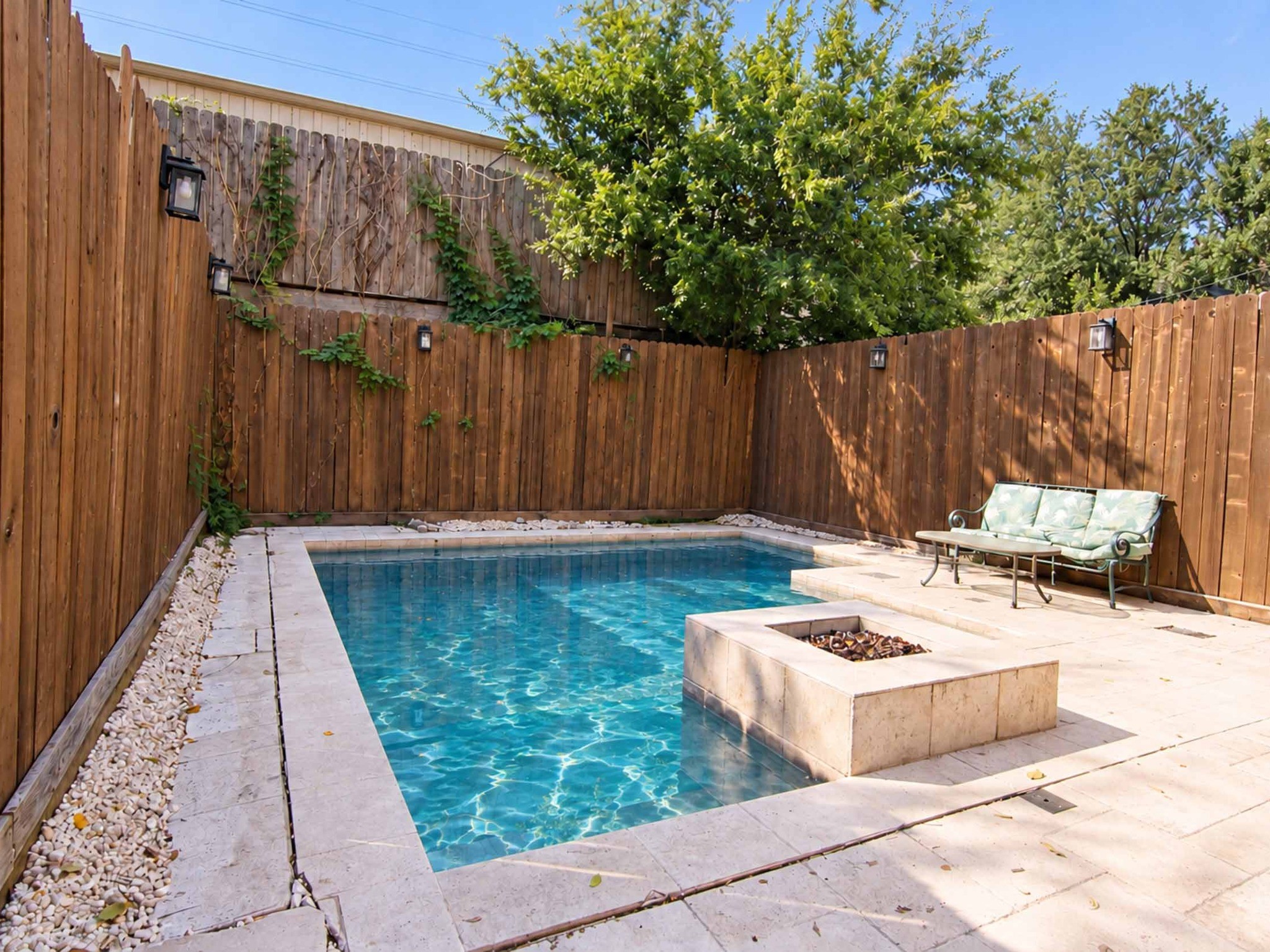 Warm up by the pool firepit.