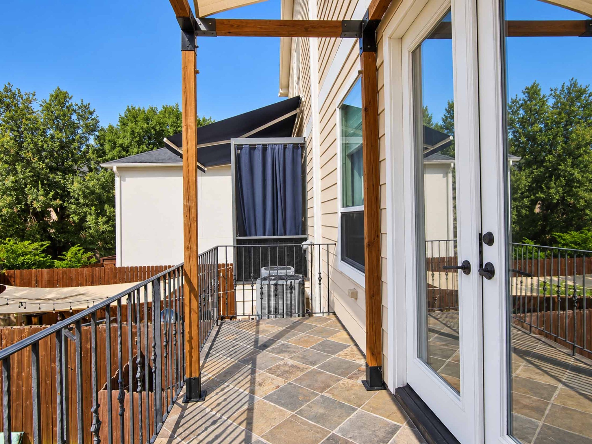 Balcony overlooking pool.