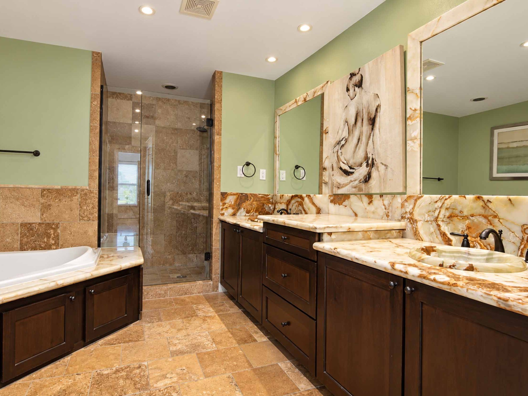 Walk in shower, double sink vanity.