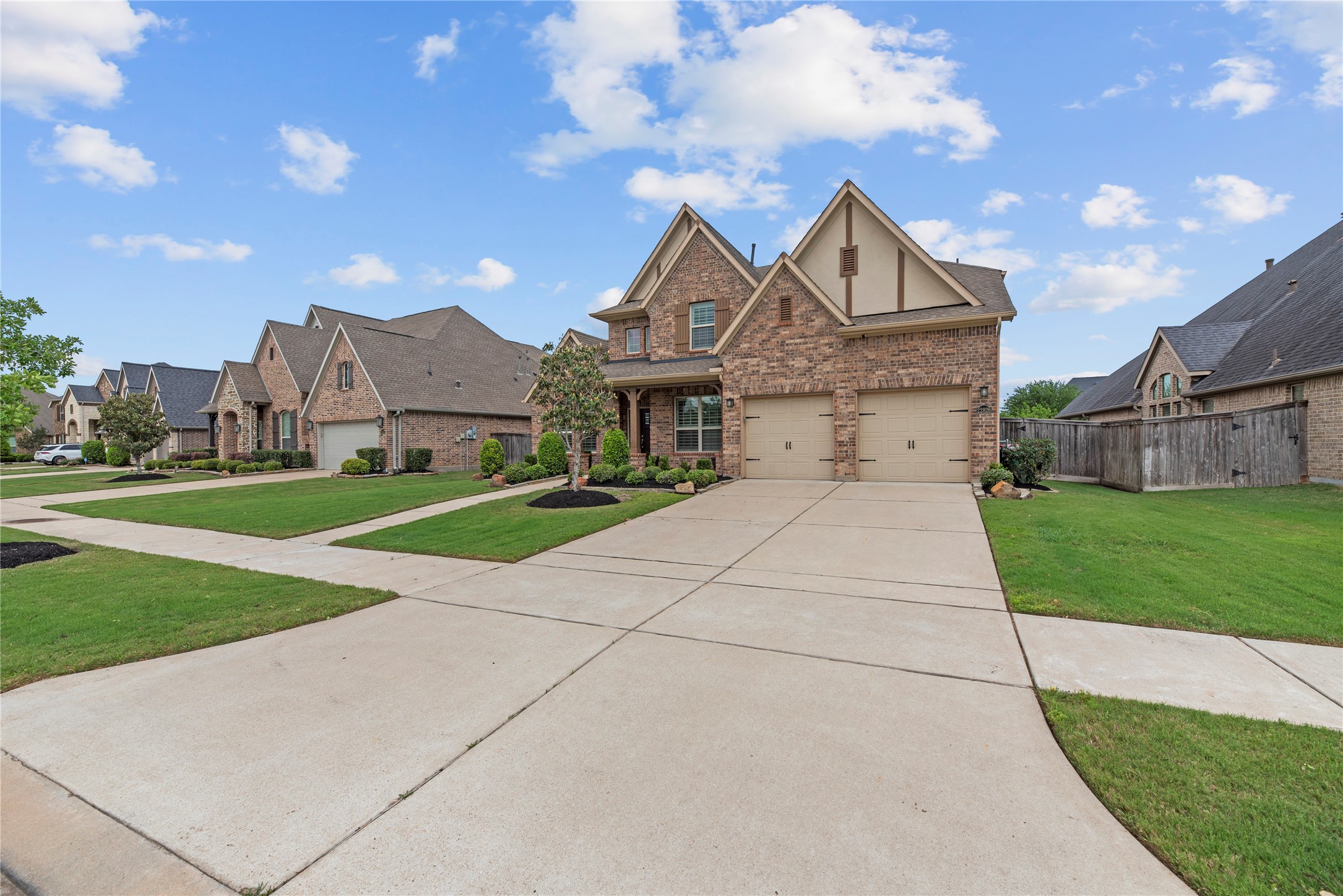 This beautiful home offers a 3 car tandem garage.