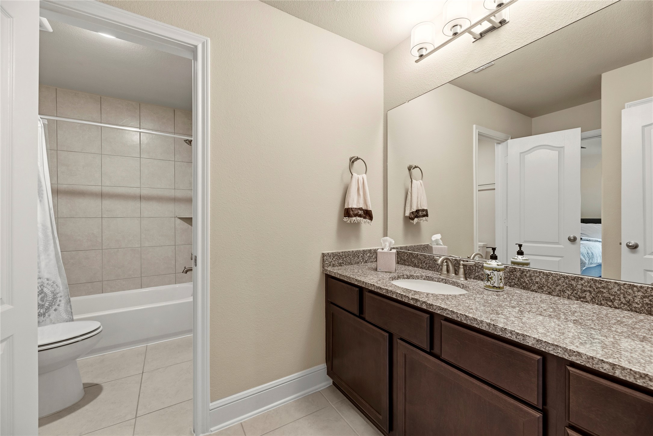 The upstairs Jack & Jill bathroom is also accessible from the game and media rooms.