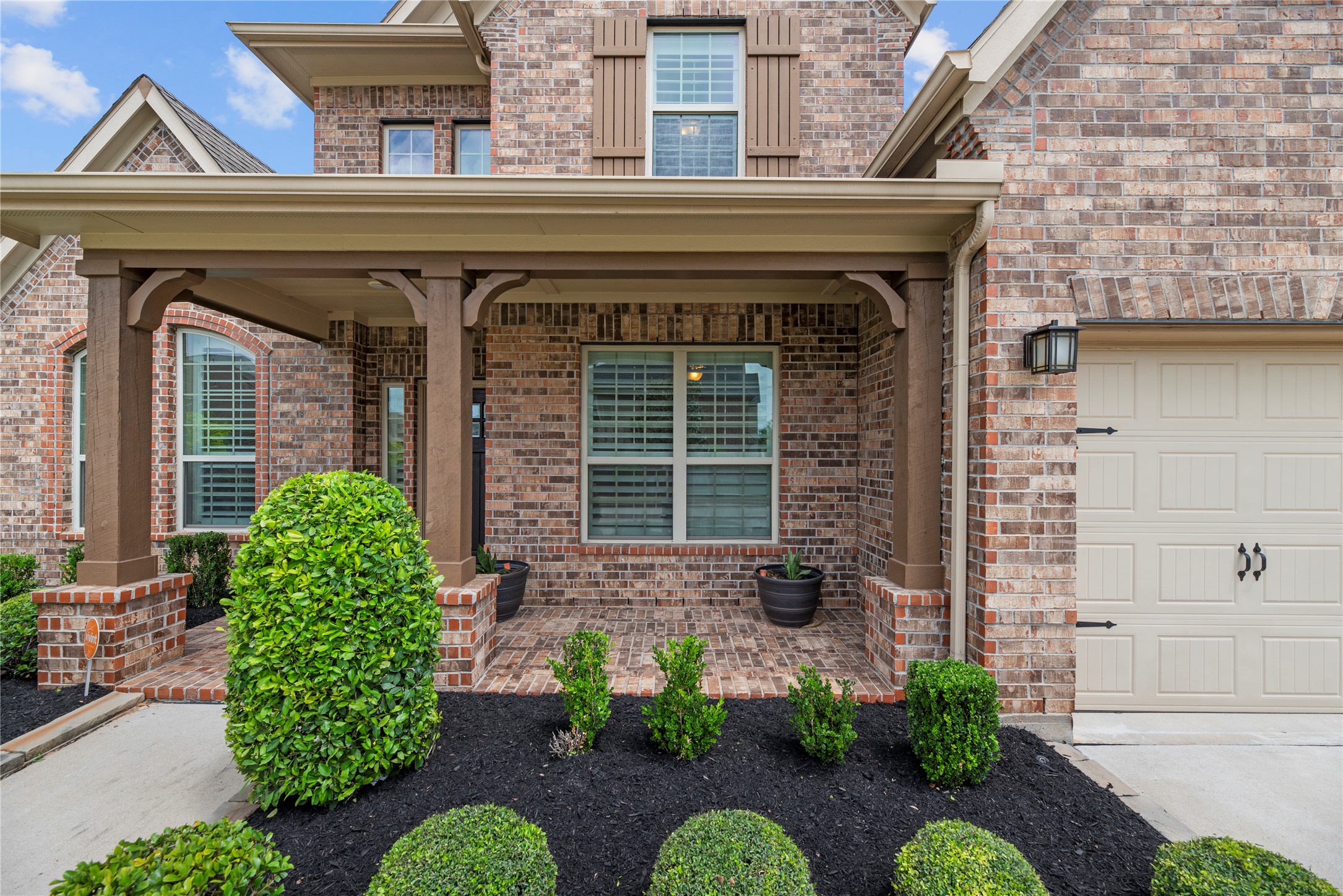 The front porch adds a touch of southern charm.