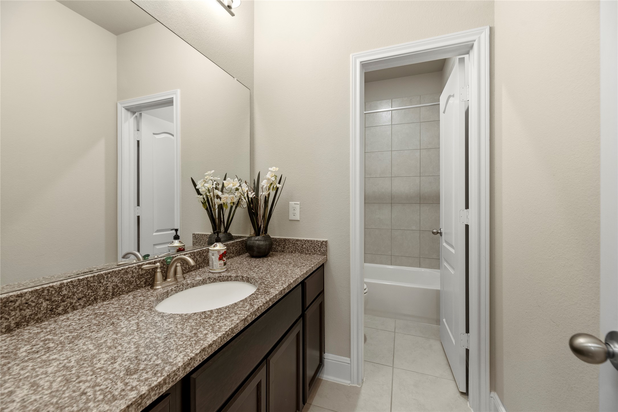 This is the downstairs full bathroom. Lots of counter space and this bath is adjacent to a bedroom.