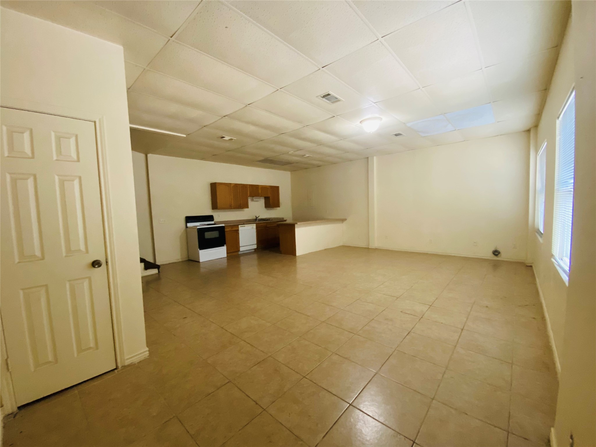 Entry with closet, Living, Dining & Kitchen