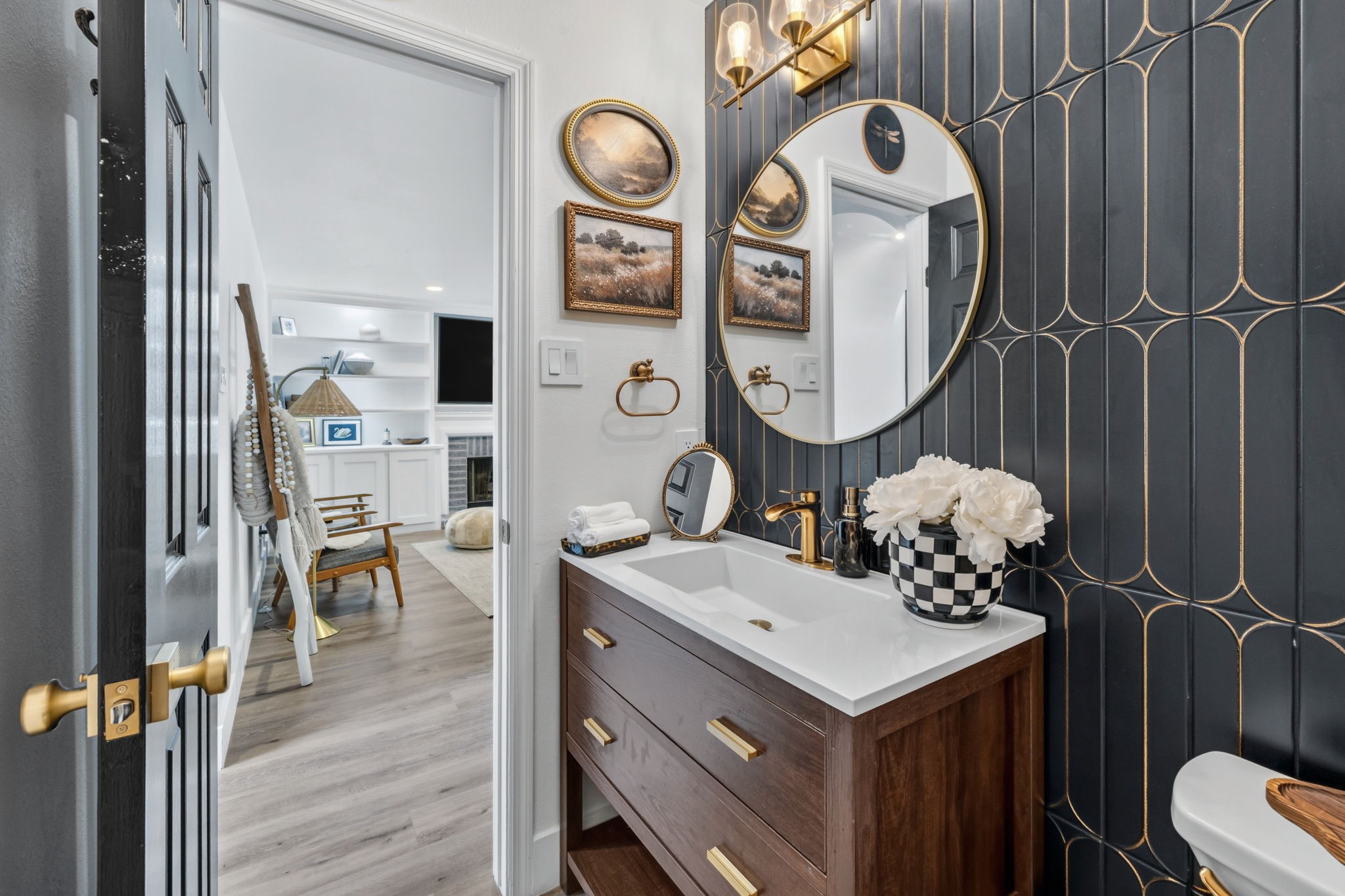 A jewel-box powder bath finished with statement tile and rich character