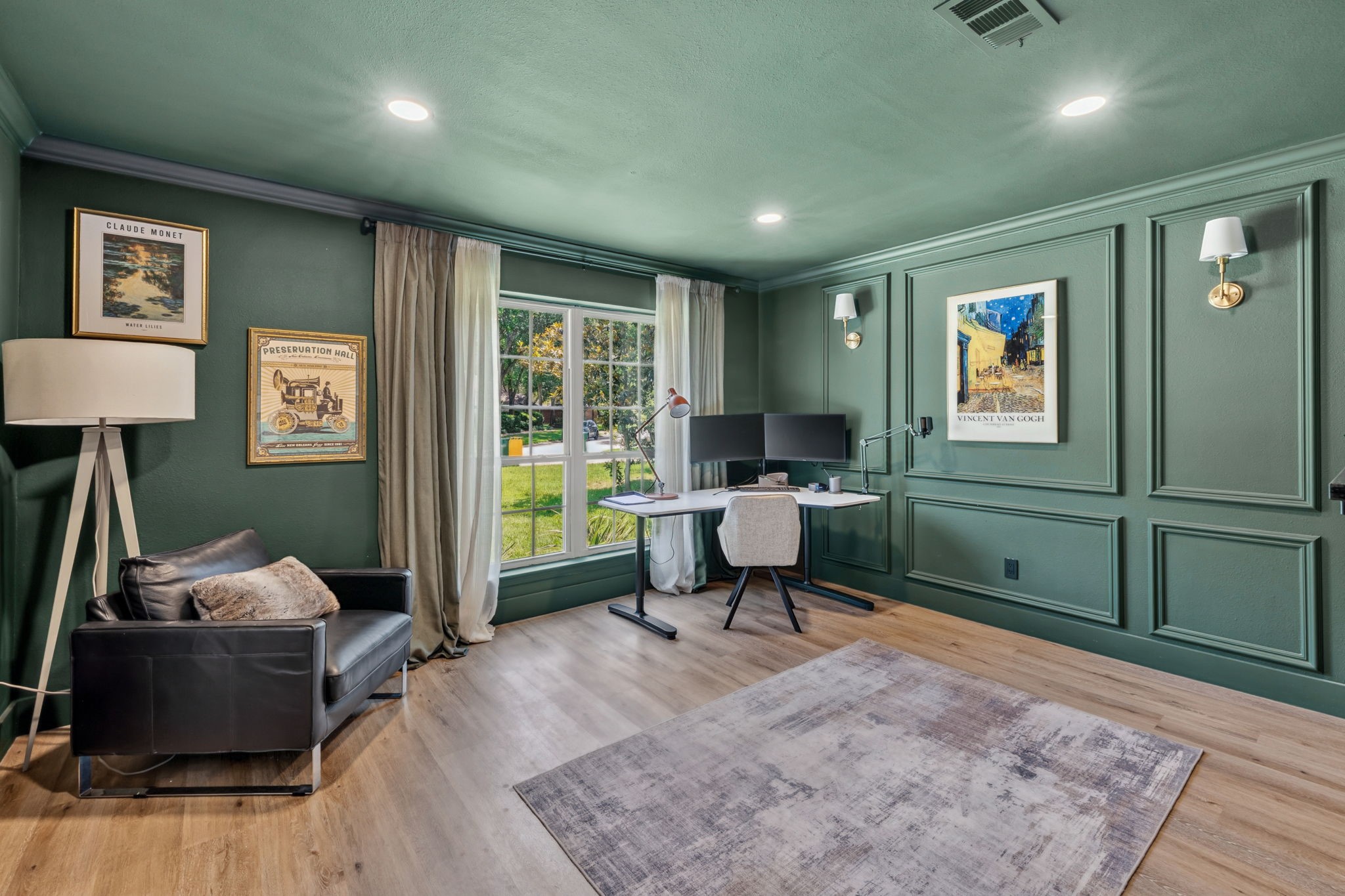 Natural light softens the rich tones and custom detailing throughout the office