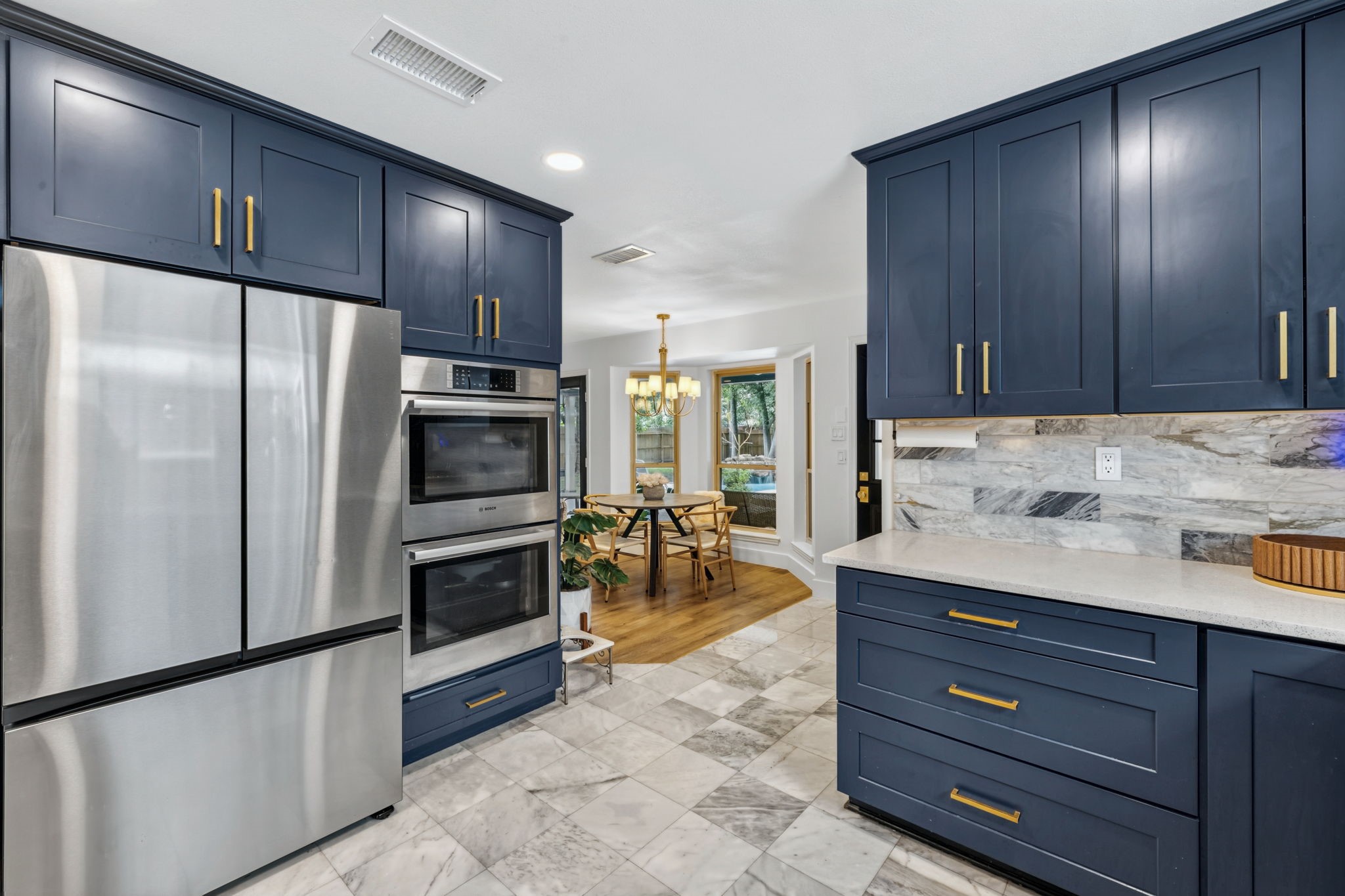 Double ovens, modern finishes, and a layout built for real life and entertaining alike