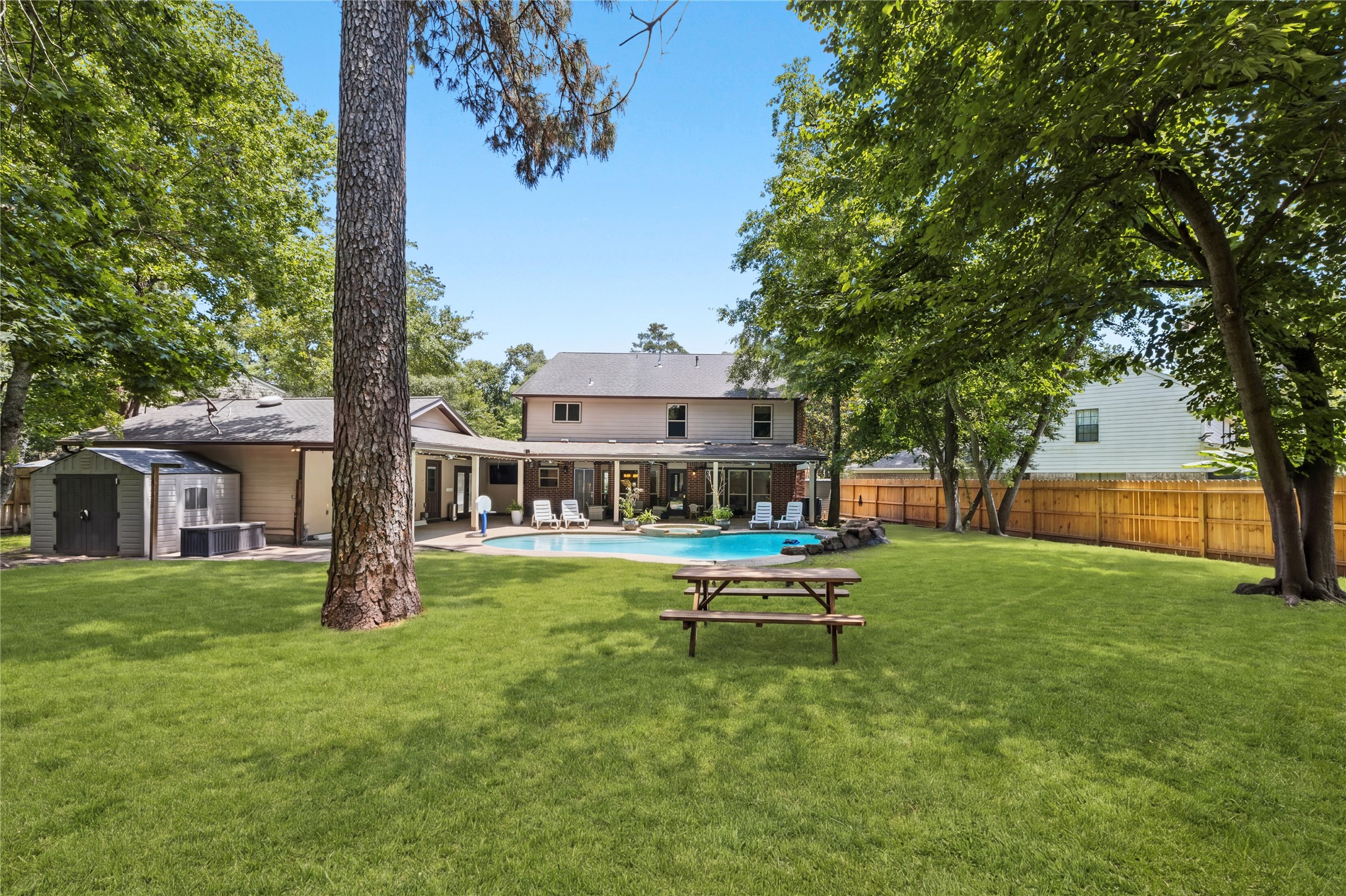 Wide open yard space paired with resort-style amenities