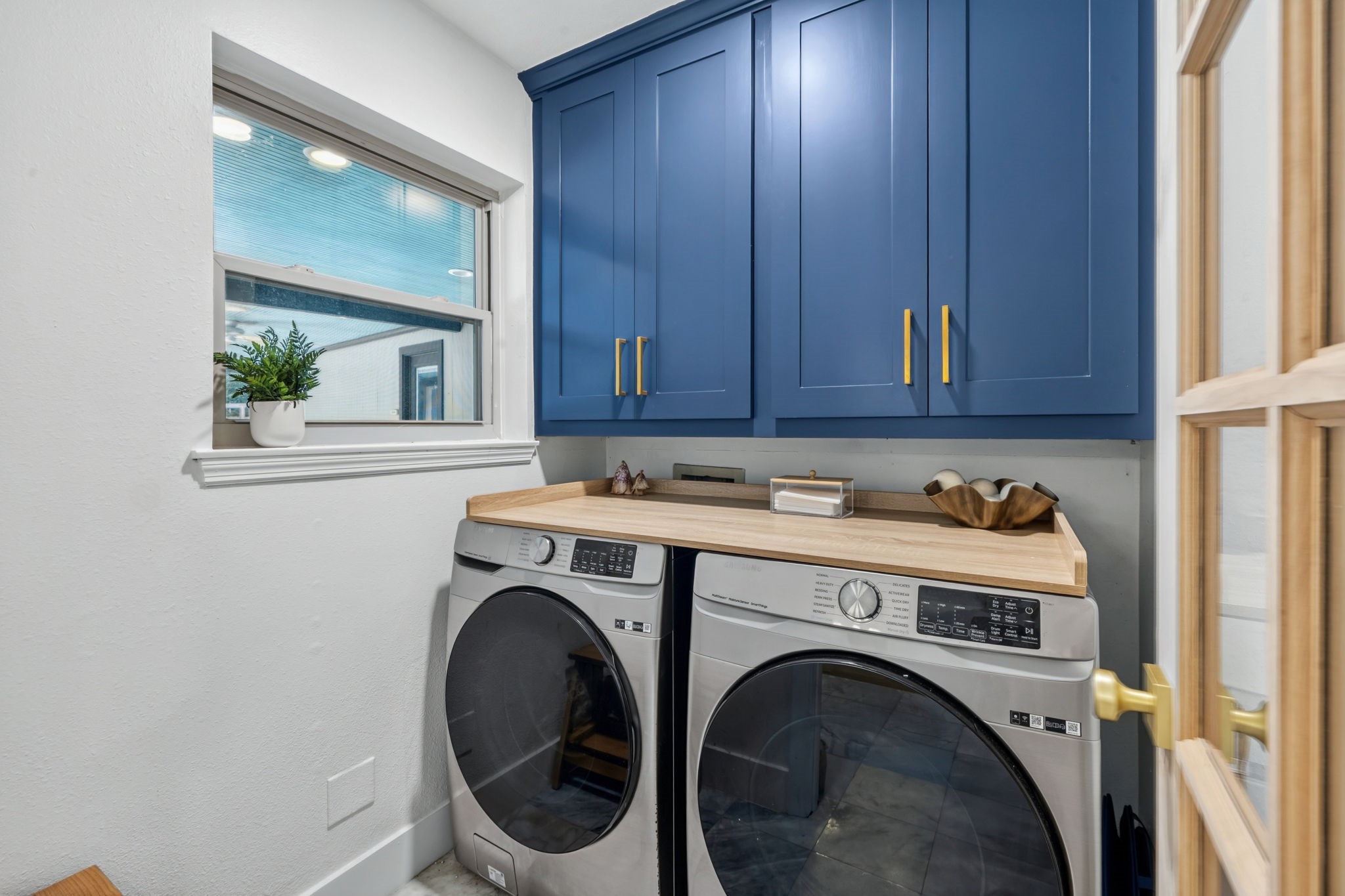 Even the laundry room carries through the homes elevated design story