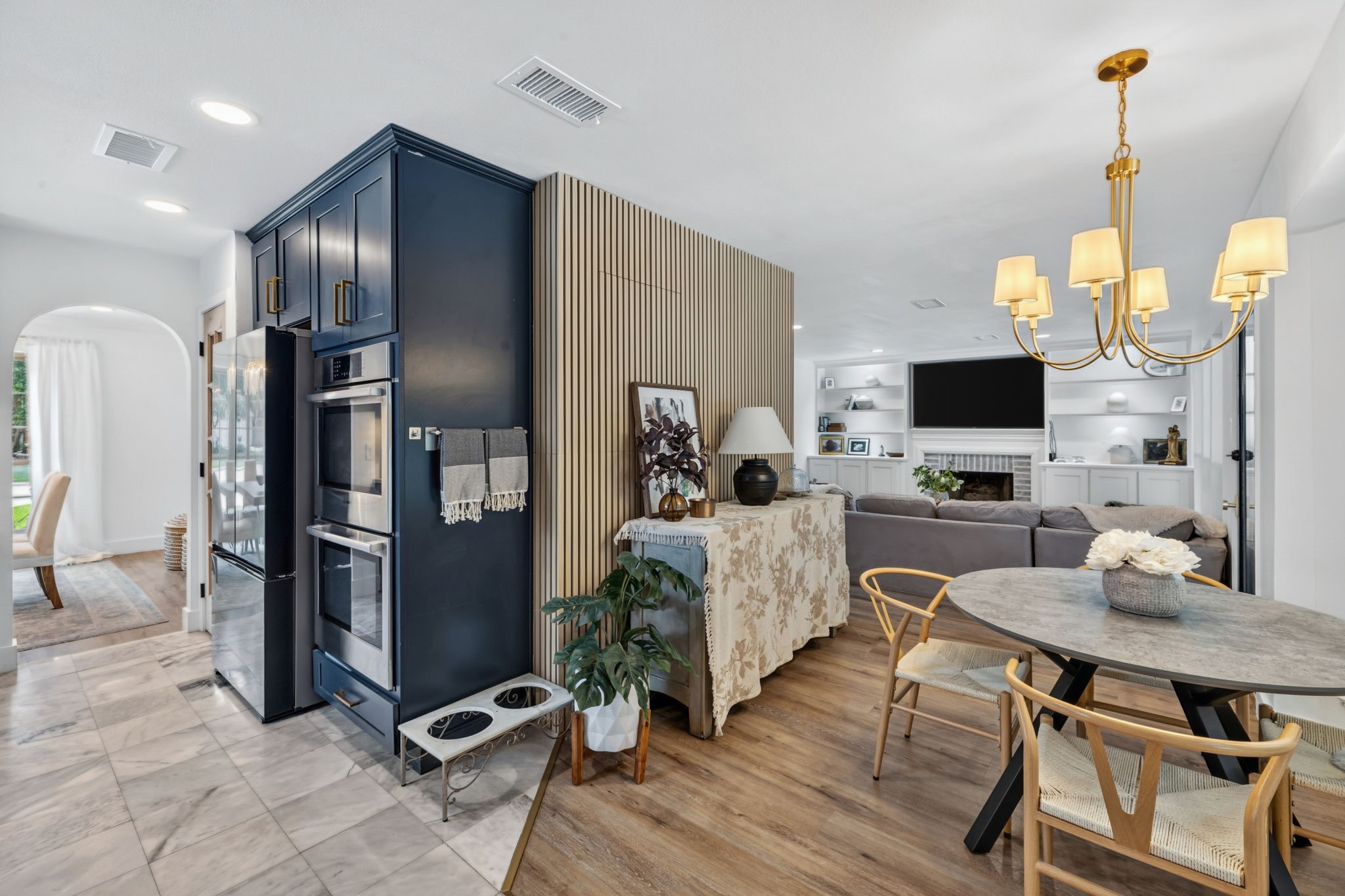 From the back entry to the breakfast room, the home flows with ease and intention
