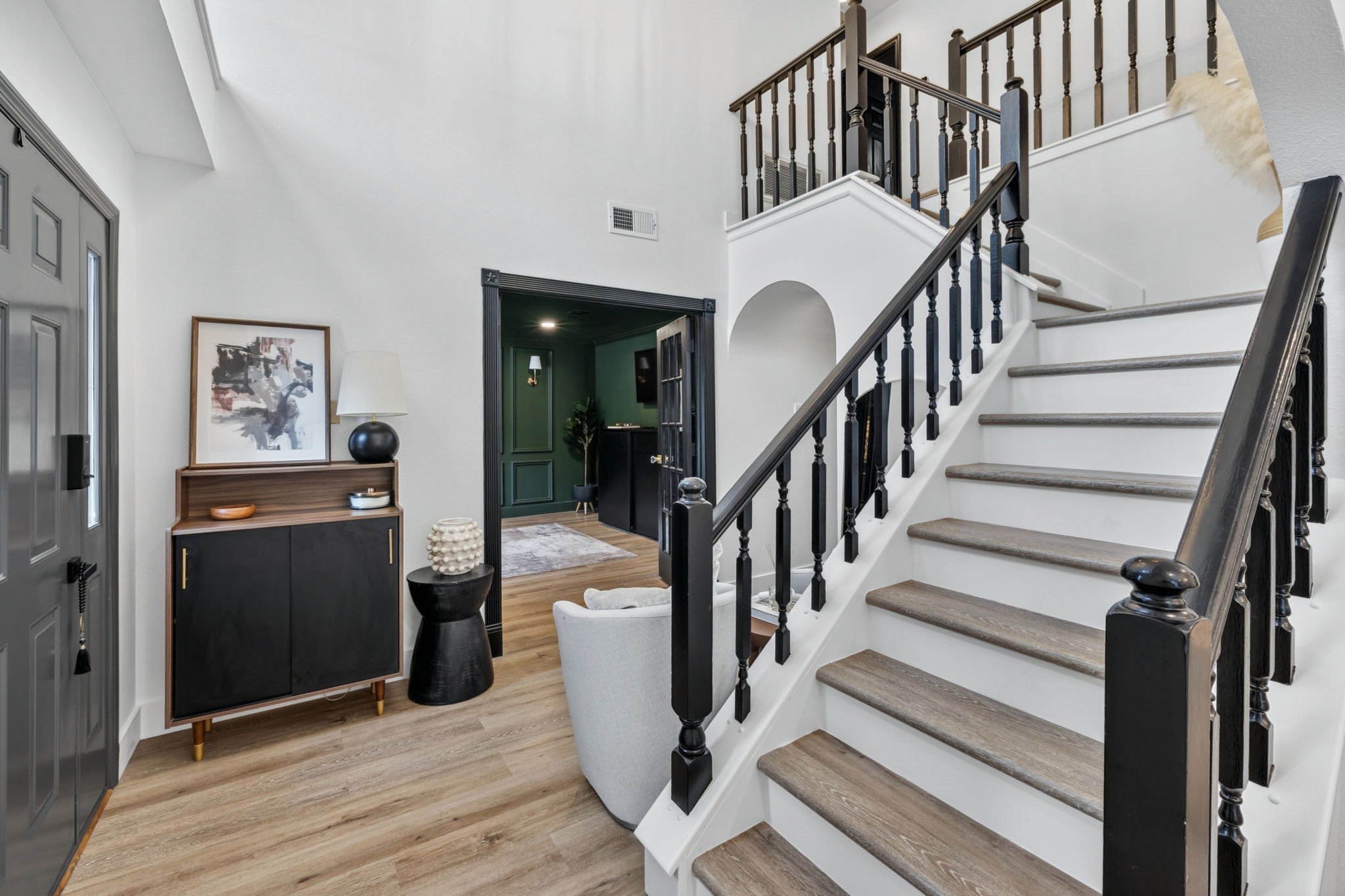 From the staircase to the office beyond, every angle feels thoughtfully curated