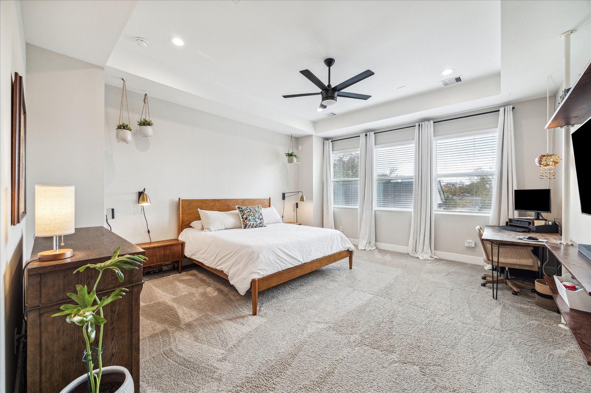 Large primary bedroom with downtown views.