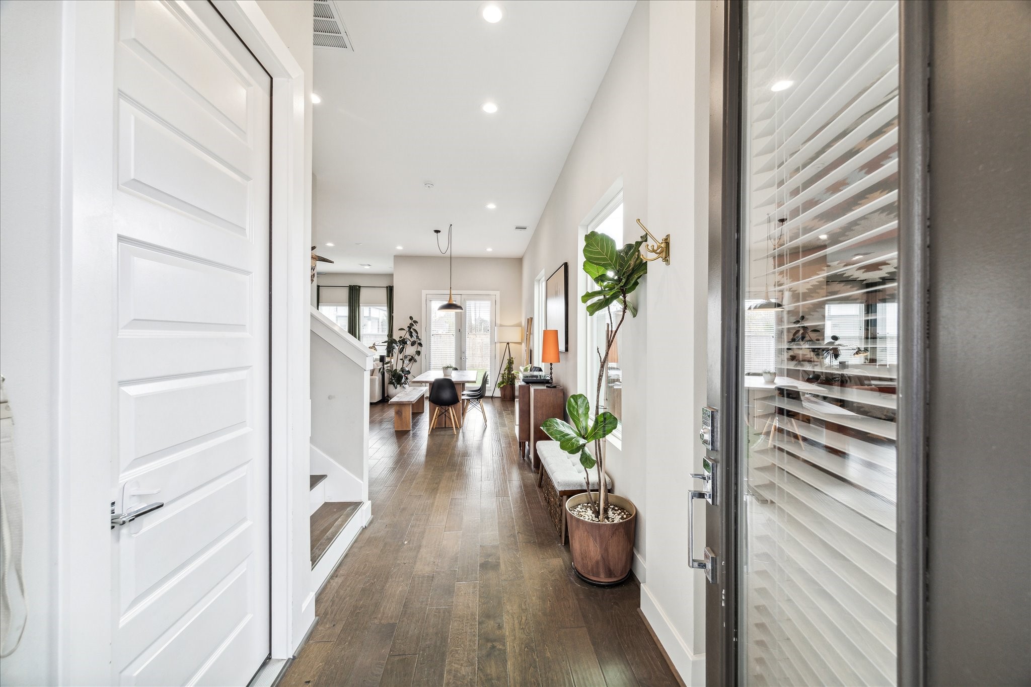 Entering into the home you are greeted with soaring ceilings throughout.