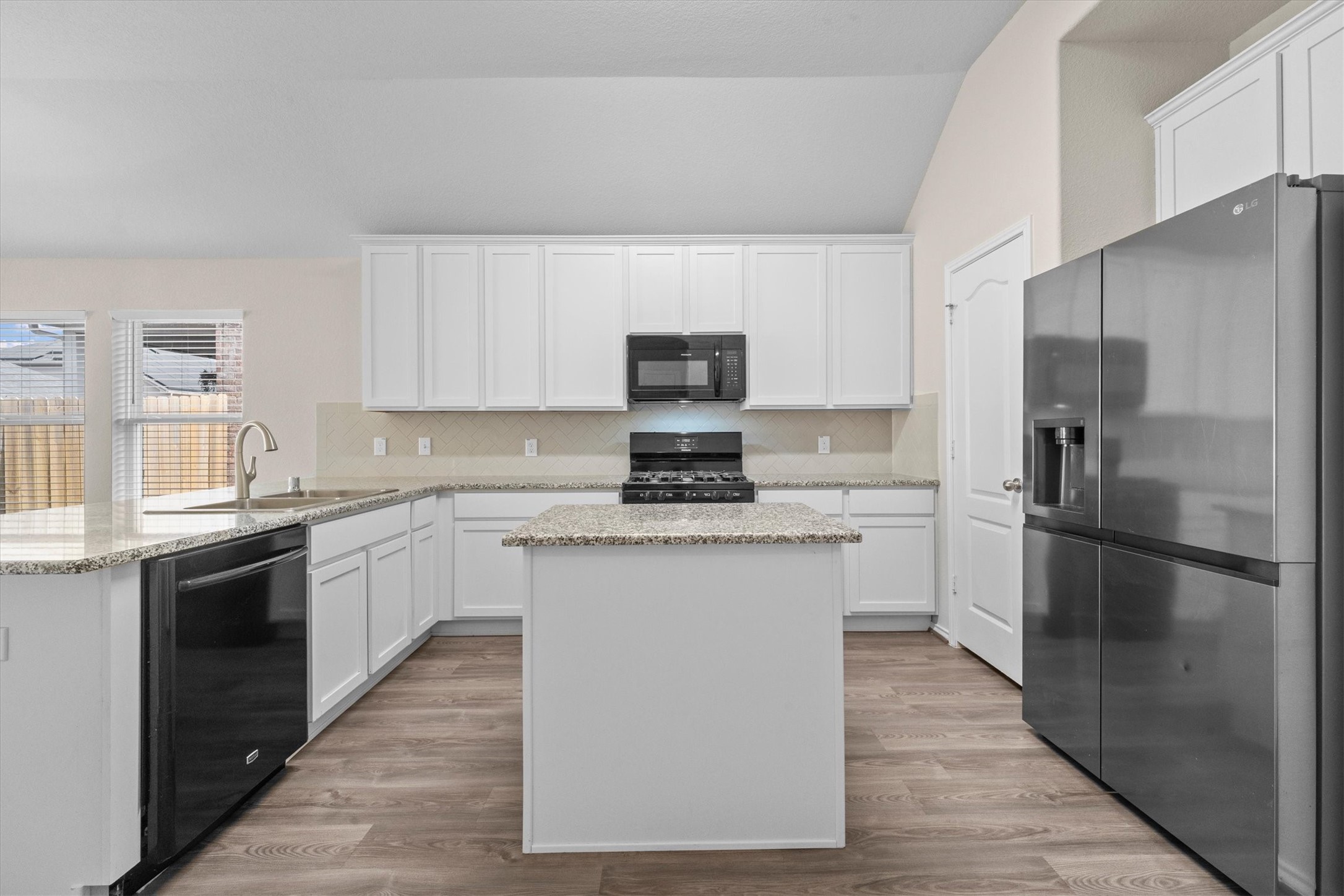 Island Kitchen with plenty of storage. Island has storage doors on other side Island Kitchen with plenty of storage. Island has storage doors on other side