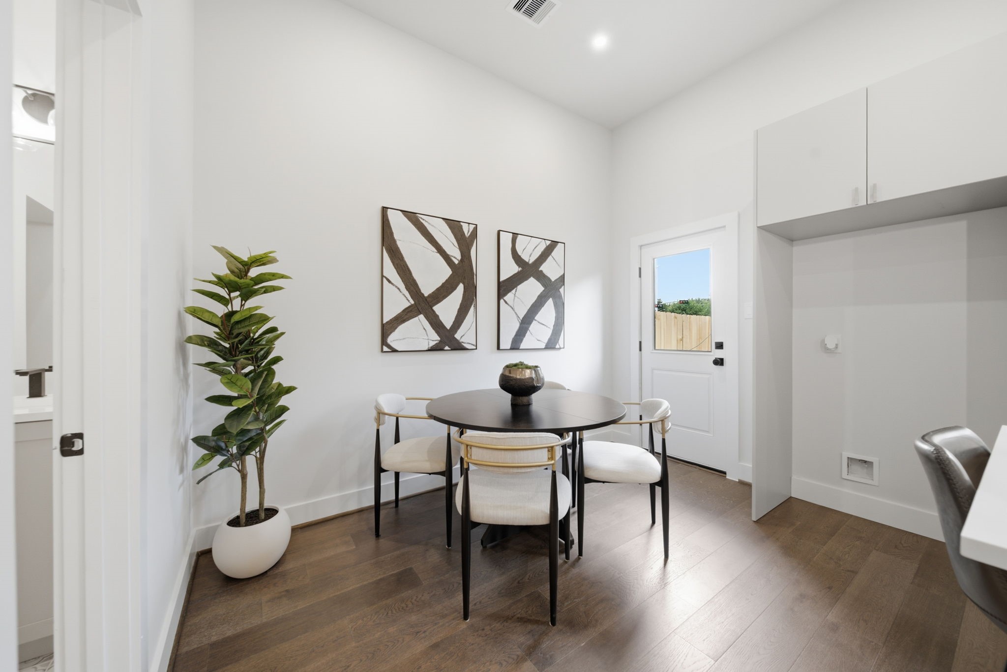 Dining area off of kitchen and backyard access
