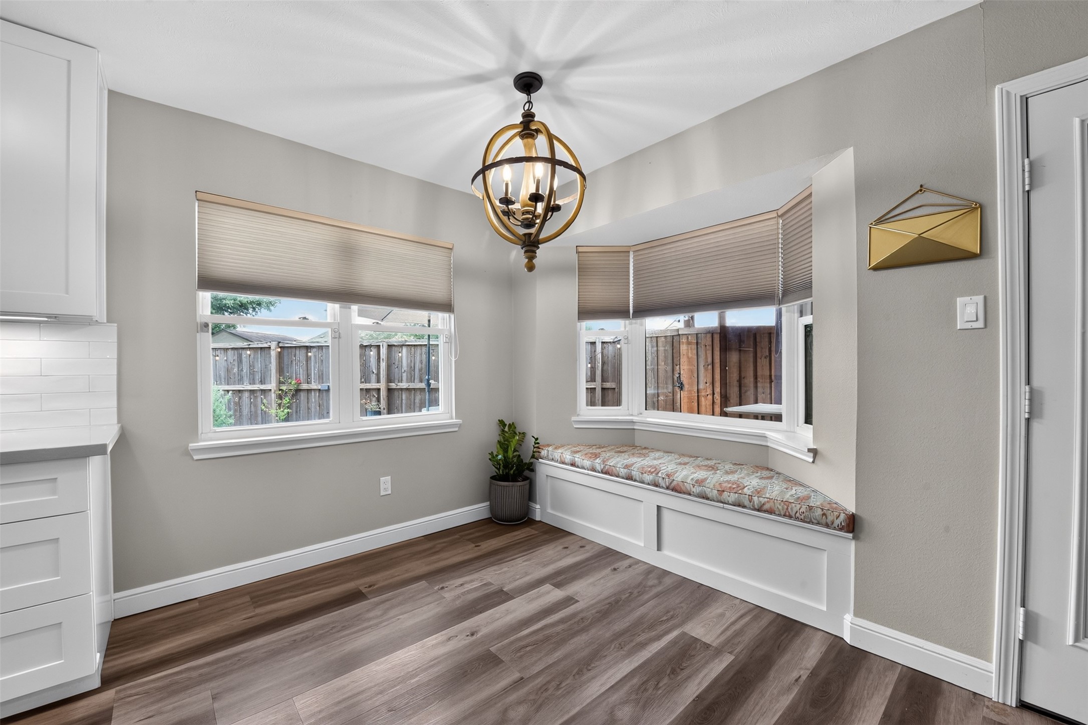 Breakfast room has window seating area.