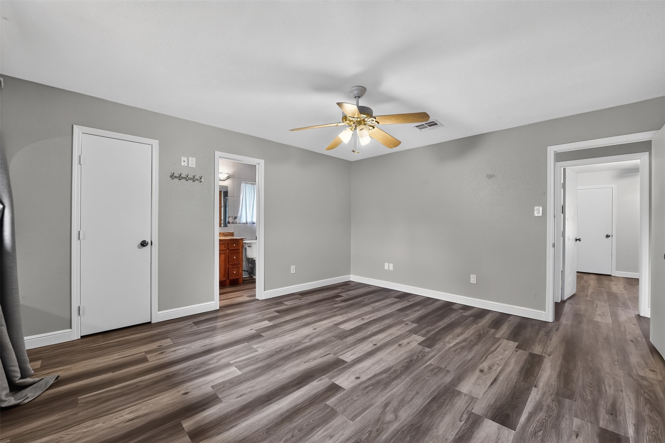 Retire at night to your spacious primary suite.
