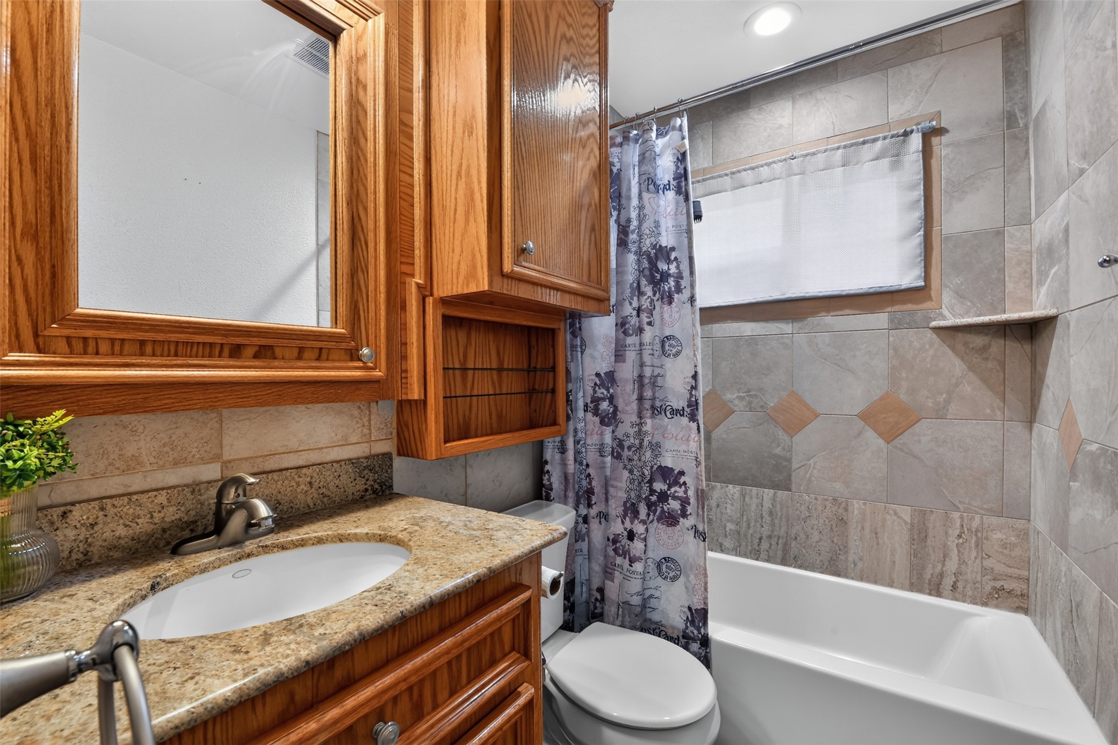 Second full bath has tub/shower and updated counters and fixtures.