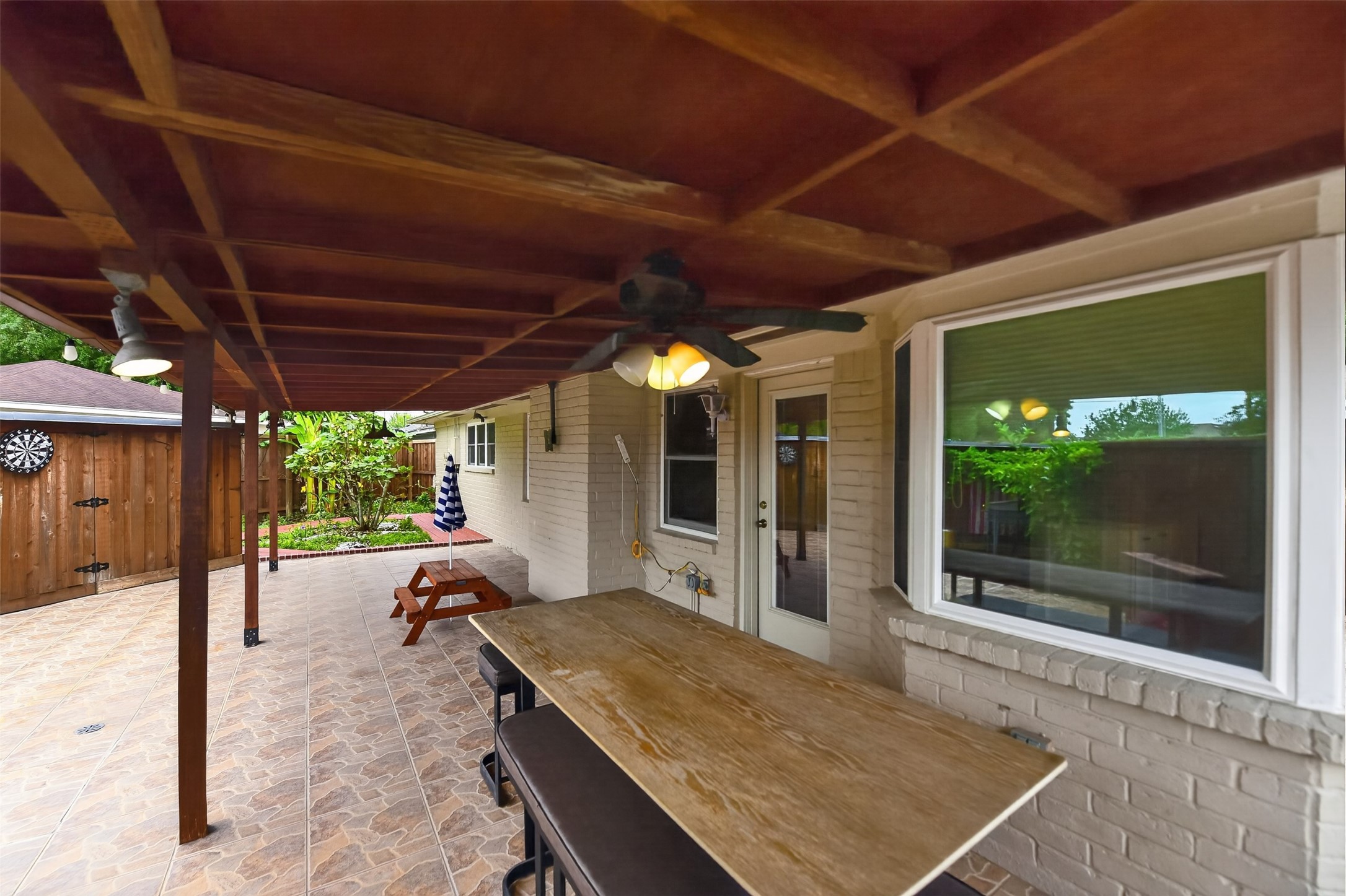 Step outside to your covered patio.