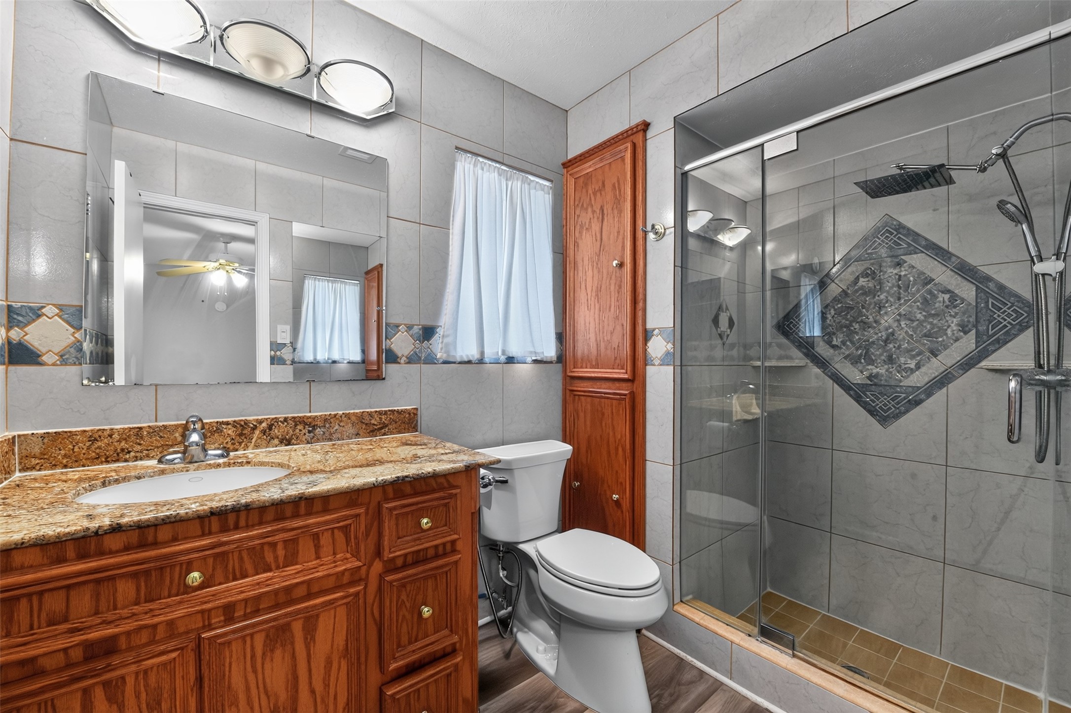 Primary bathroom has been remodeled and updated with walk in shower.