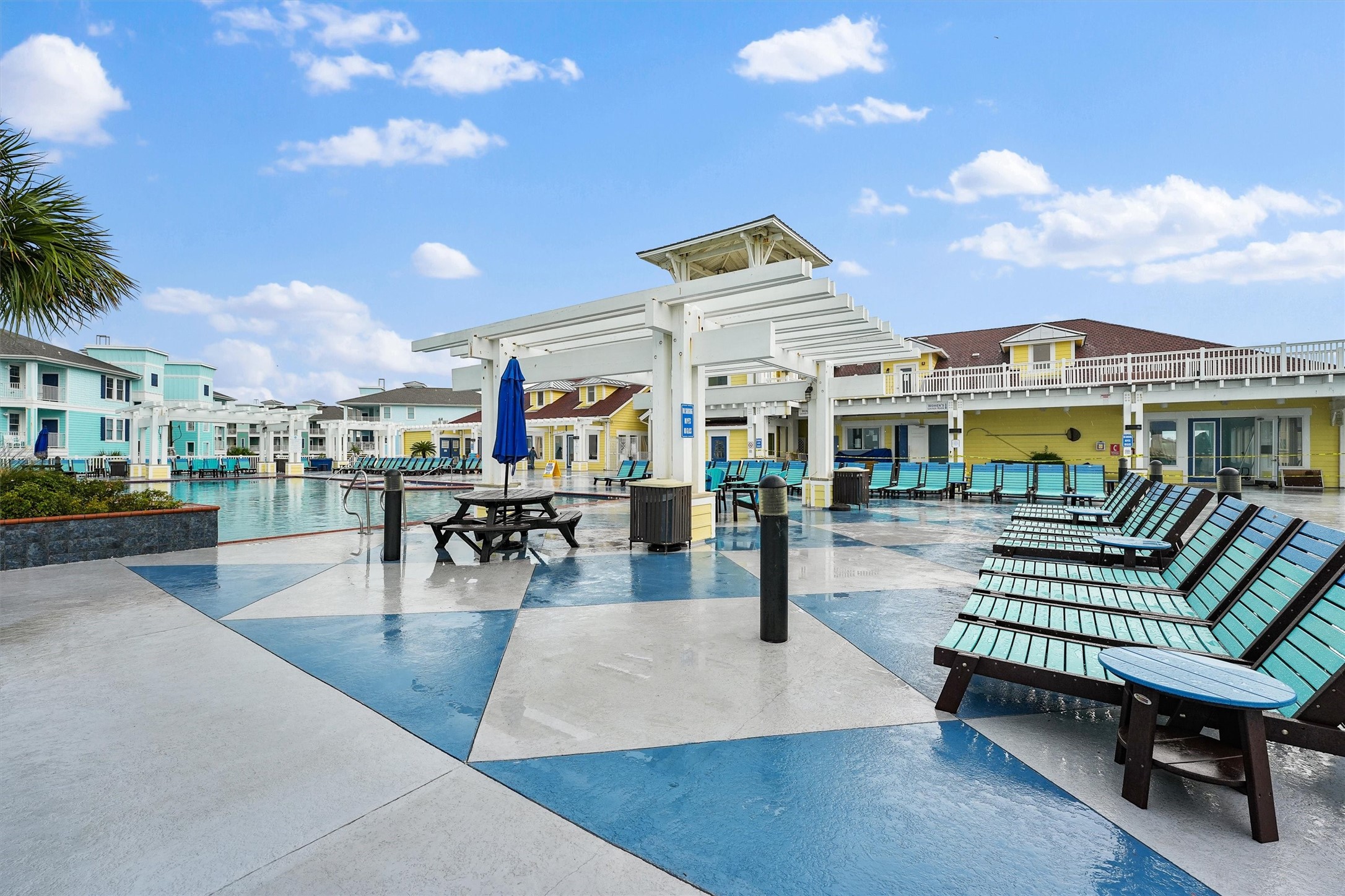 Another view of the community
pool highlights its spacious
design with plenty of lounge
seating for all-day relaxation.
