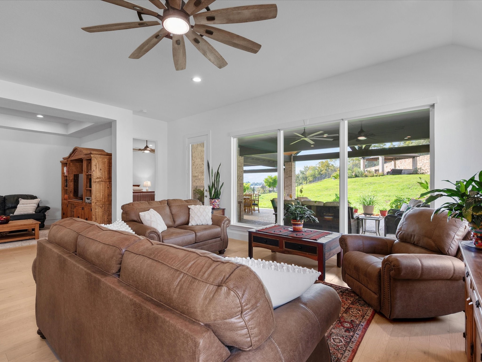 Living space with full length window views of the beautiful outdoor areas!