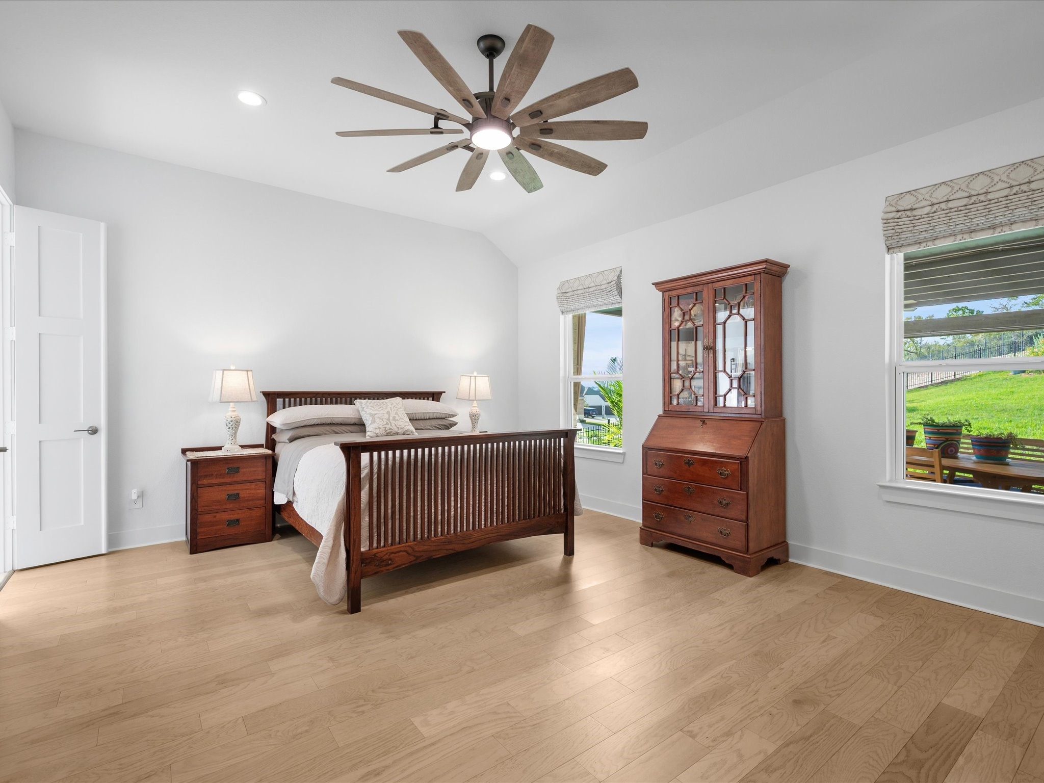 Primary bedroom with garden views, remote controlled blinds