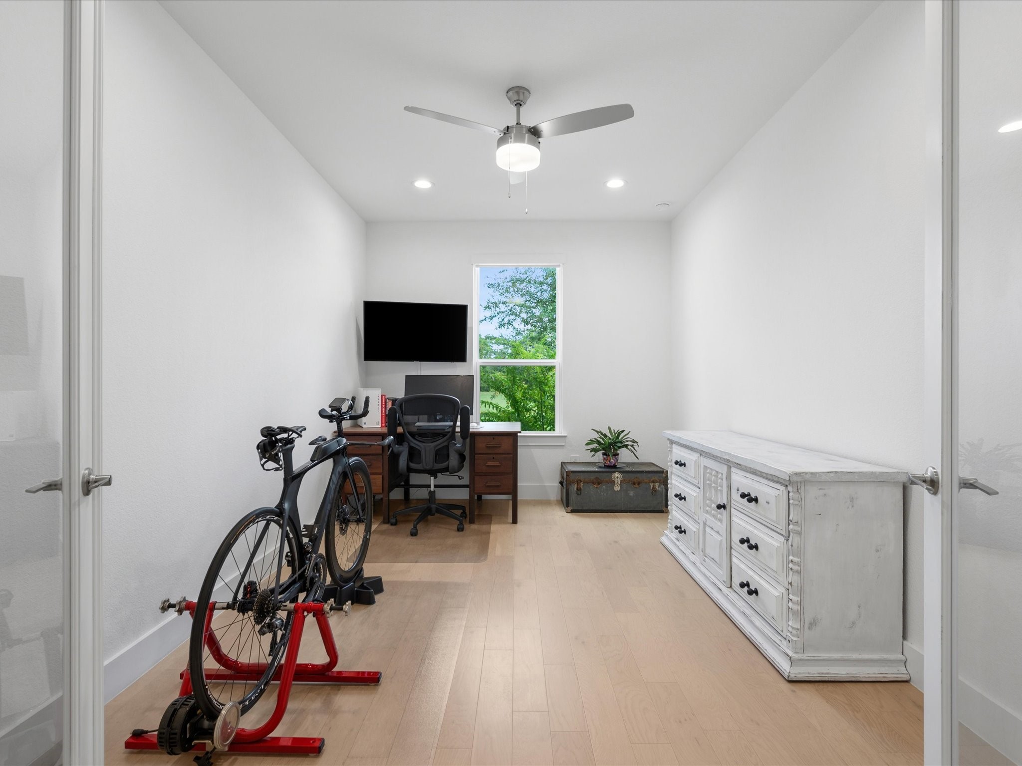 Your own private work-from-home office framed by full length double glass doors.
