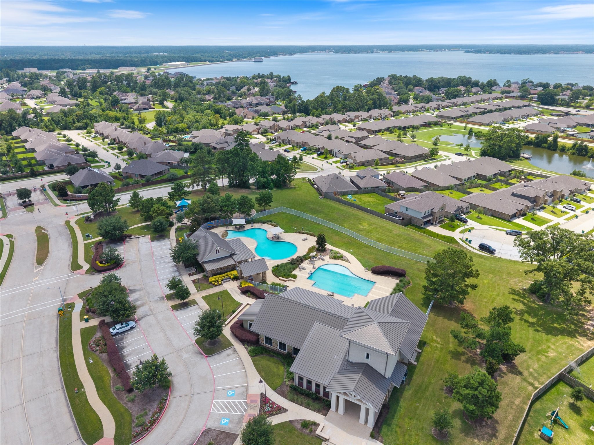 View of the clubhouse & 2 pools!