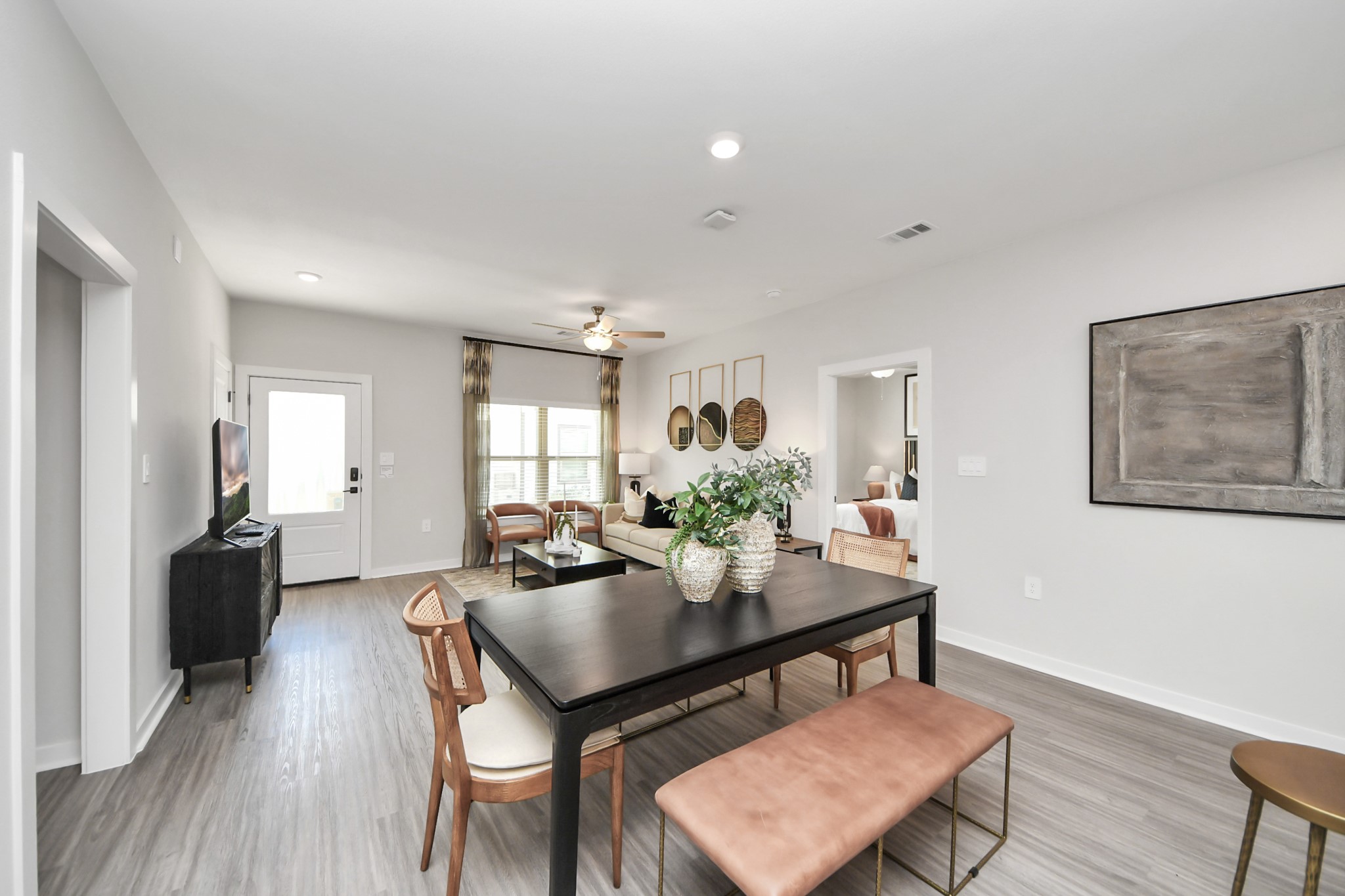 Boasting luxury finishes-stylish Island kitchen,granite counters,subway tile backsplash,ample custom cabinet space,stainless appliances,refrigerator,full size washer&dryer included,wood-like flooring throughout,open concept floor plan.