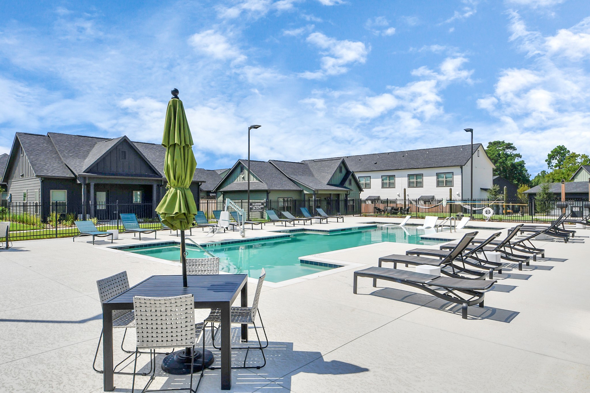 Enjoy an abundance of Amenities:Resort-Style Pool w/Sundeck Ledge&Outdoor Lounge Areas w/Grilling area,Gaming Lawn,Pickleball Court,Quaint Dog Park for your fur babies!24/7 Fitness Center w/Kids Play Zone area.Stunning Clubhouse w/Caf/Lounge.Playground Area.Electric Vehicle Charging Stations!