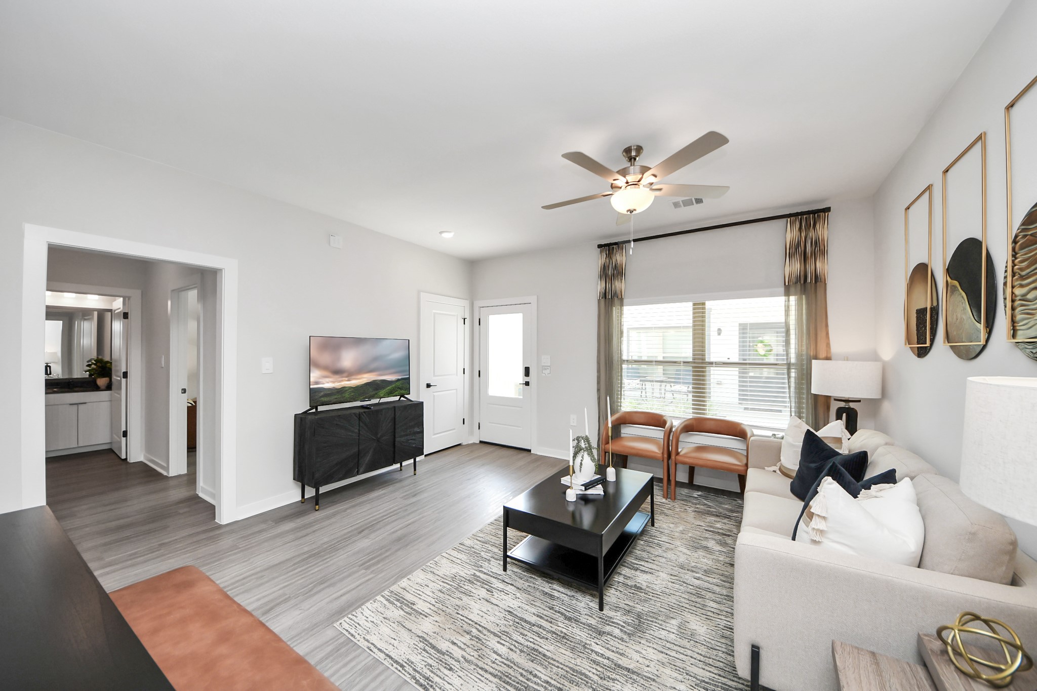 Boasting luxury finishes-stylish Island kitchen,granite counters,subway tile backsplash,ample custom cabinet space,stainless appliances,refrigerator,full size washer&dryer included,wood-like flooring throughout,open concept floor plan.