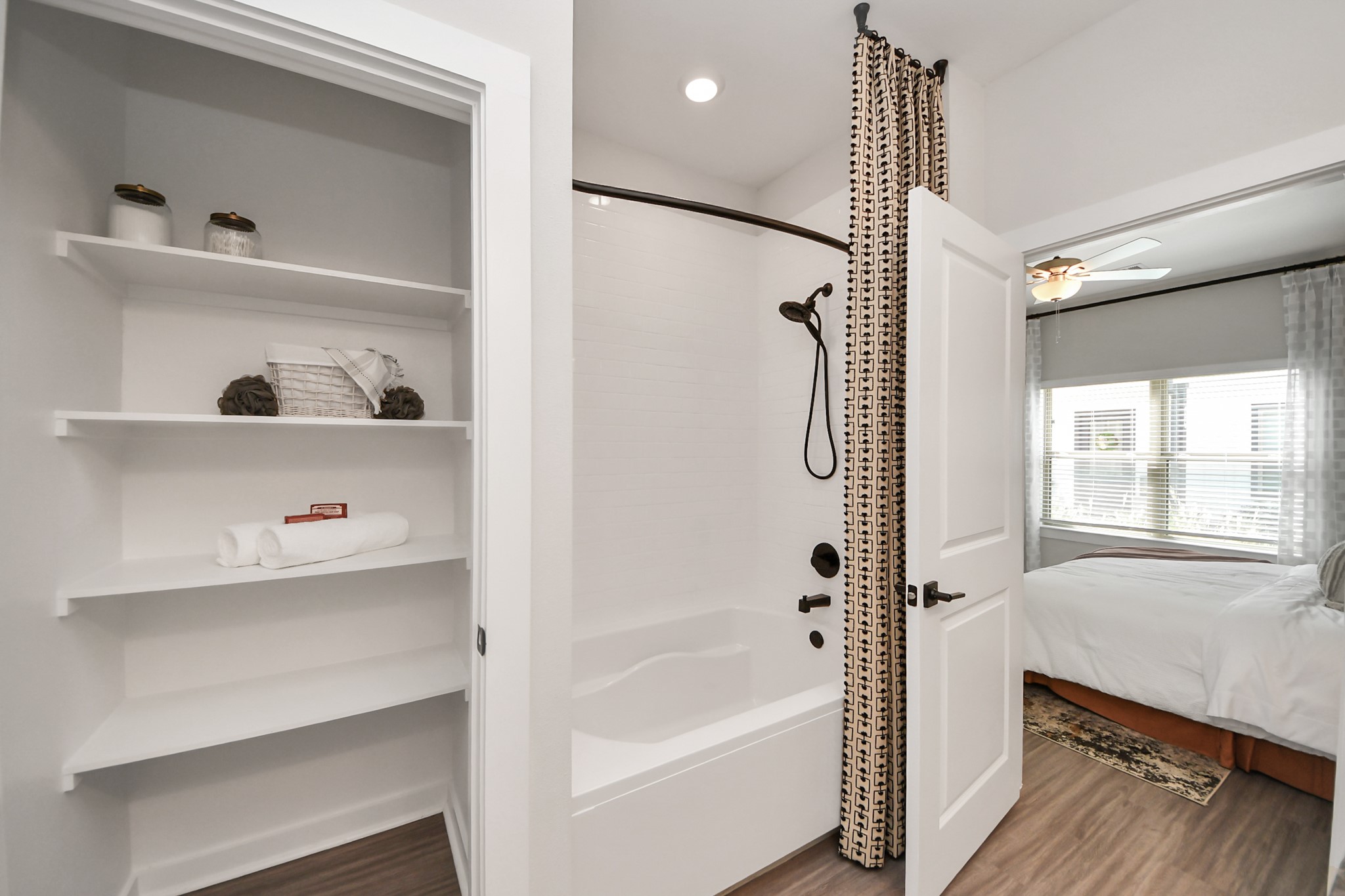 Primary Suite offers walk-closet,bath w/dual vanities&lux tub/shower.
