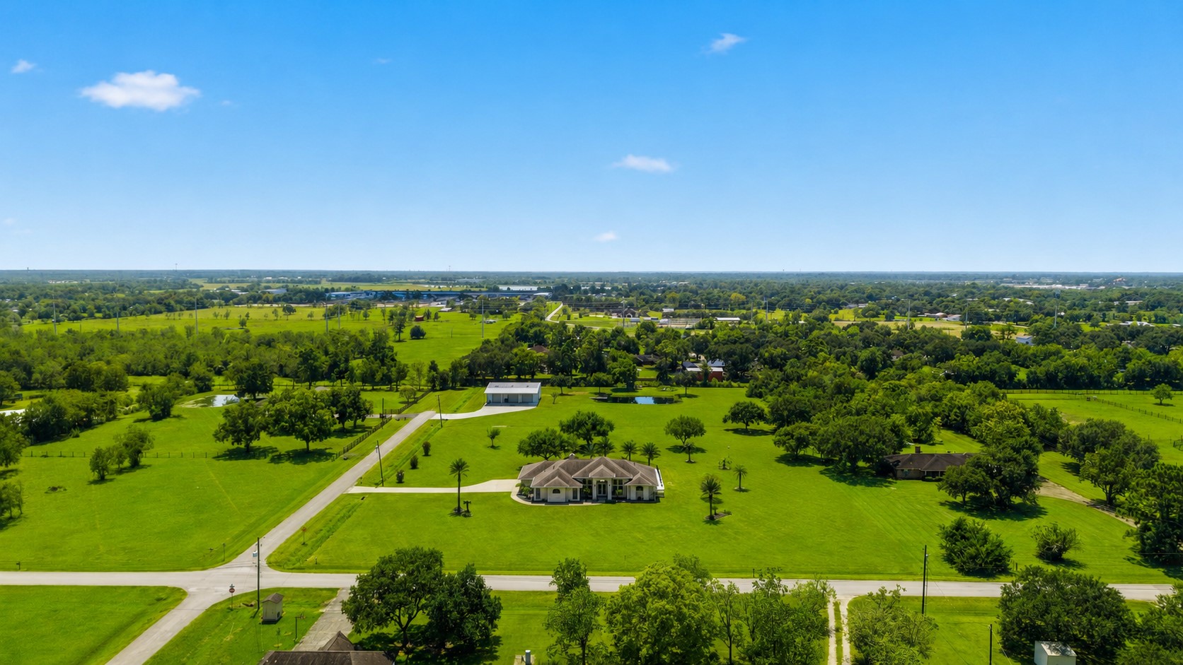 Beautiful exterior with mature landscaping and abundant open space