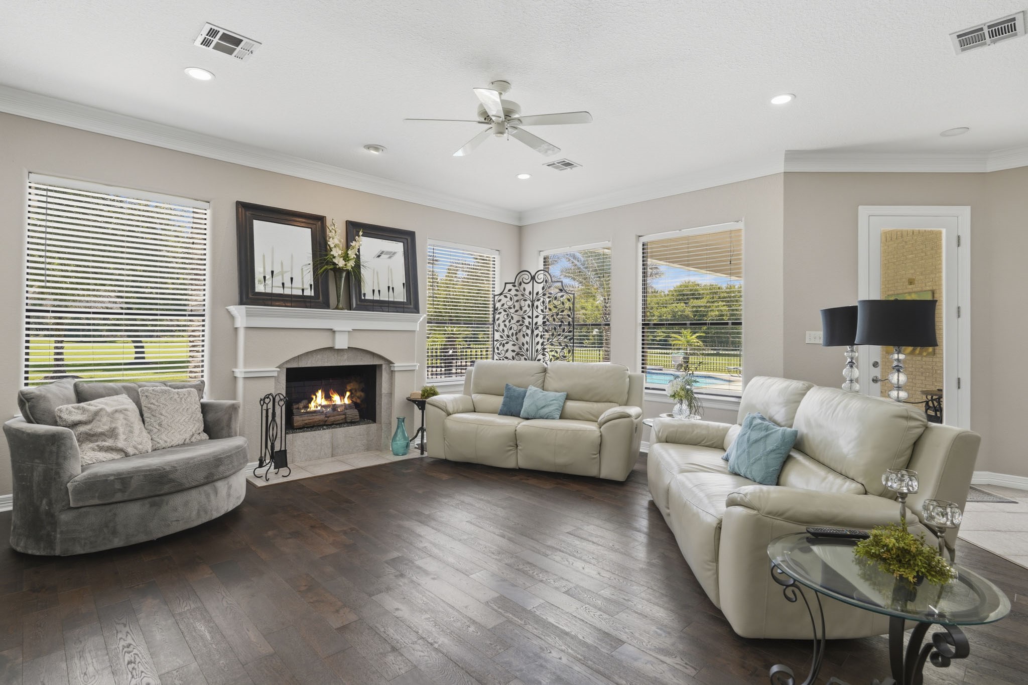 Bright, open living spaces with views toward the pool