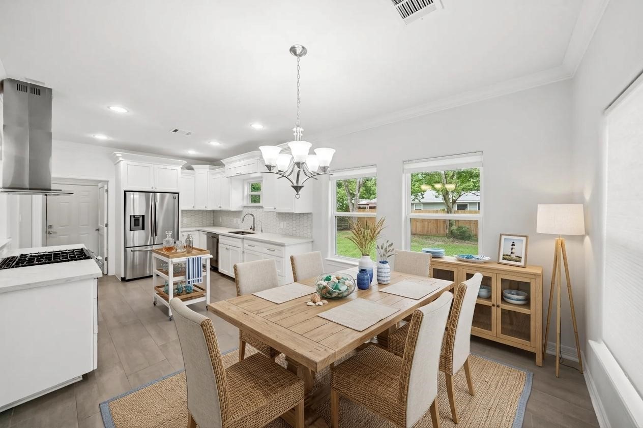 Virtually staged Dining Room.