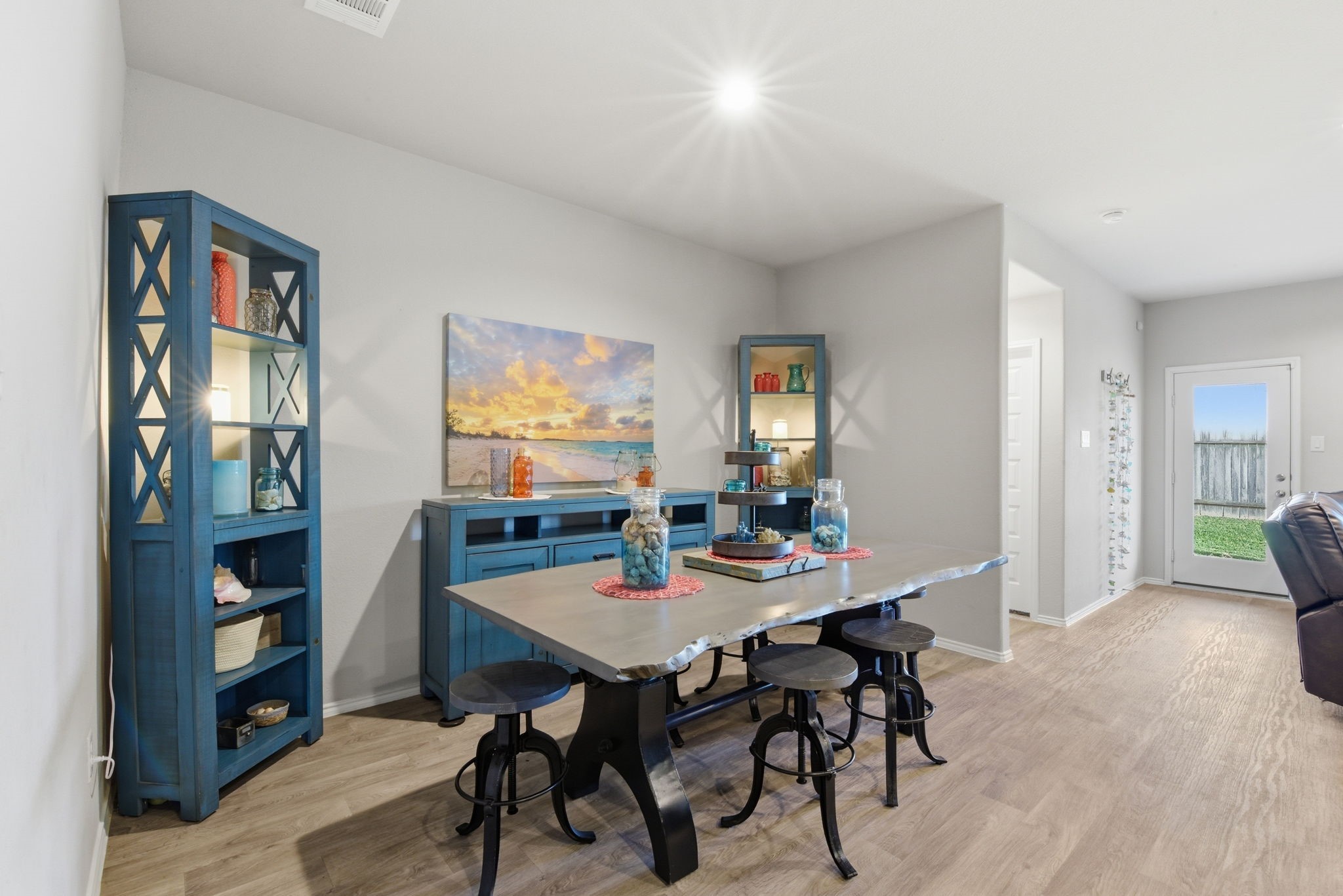 Open dining area connected to kitchen and living room for seamless flow.