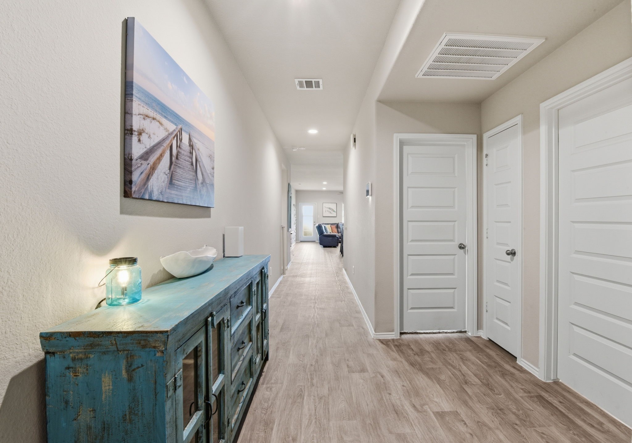 Welcoming entryway with open-concept layout leading into main living areas.