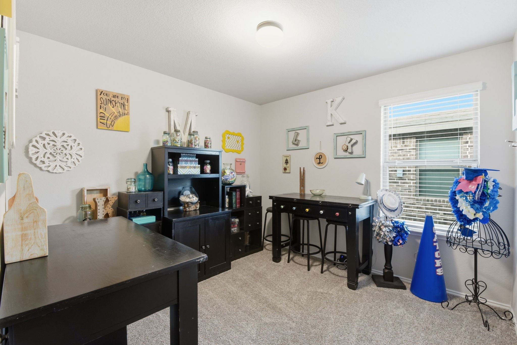 Comfortable guest bedroom or home office with flexible use.