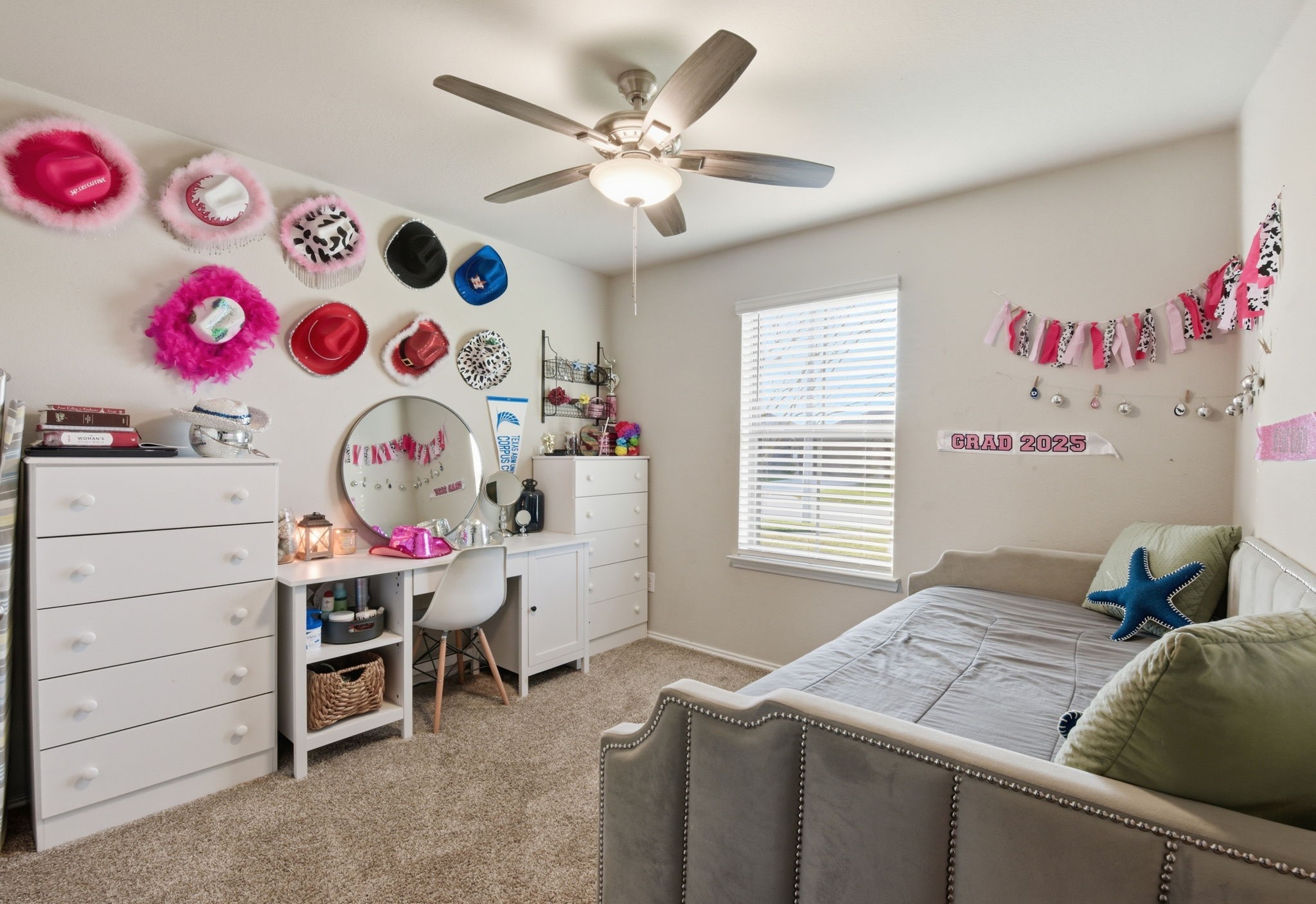 Generously sized secondary bedrooms with carpet flooring and natural light.