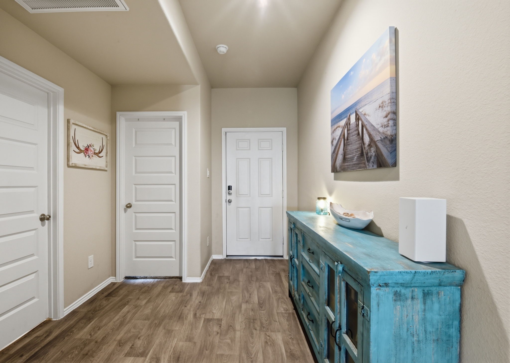 Bright foyer with modern finishes throughout.