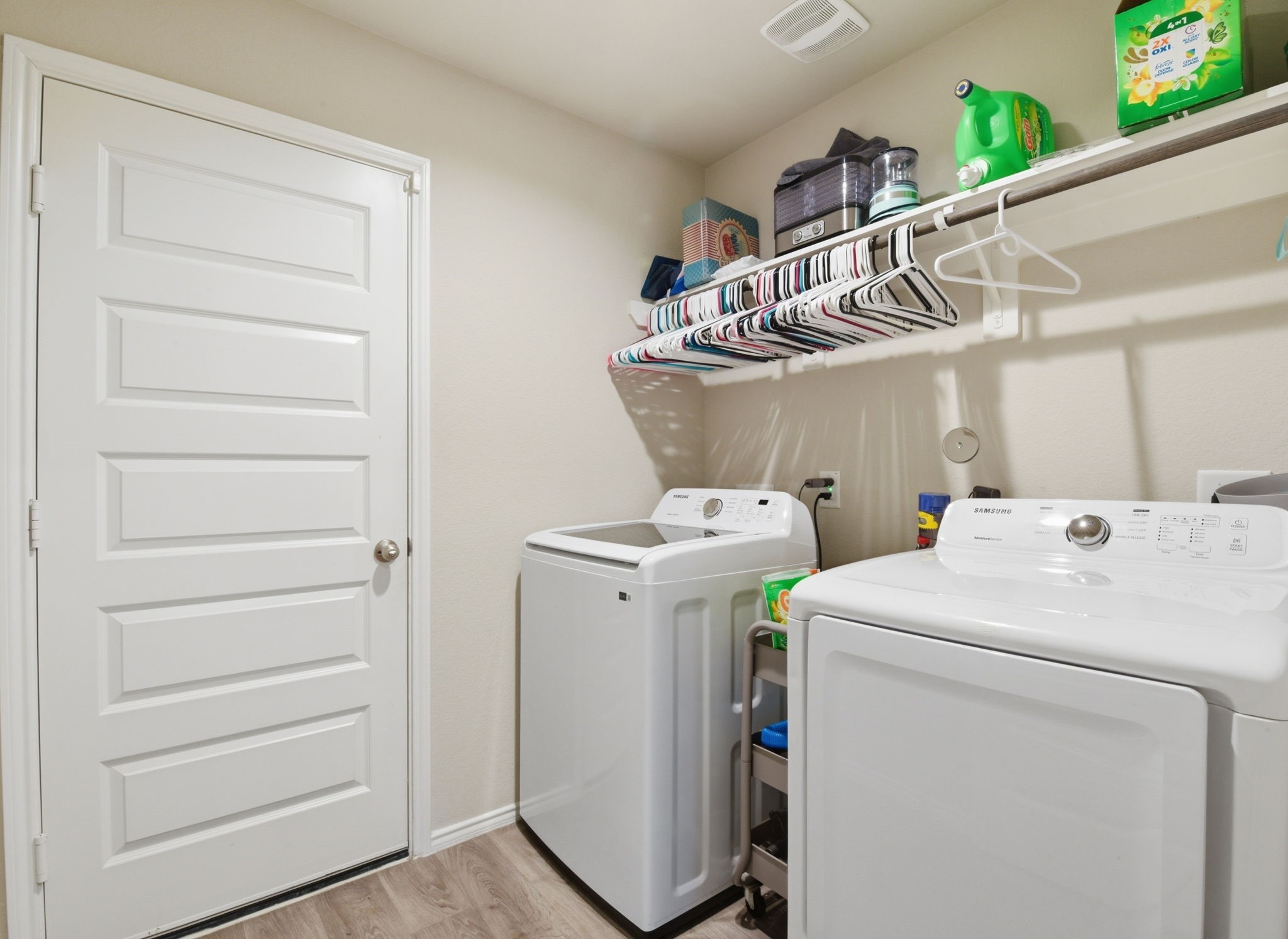 Convenient in-house utility room with washer and dryer connections.