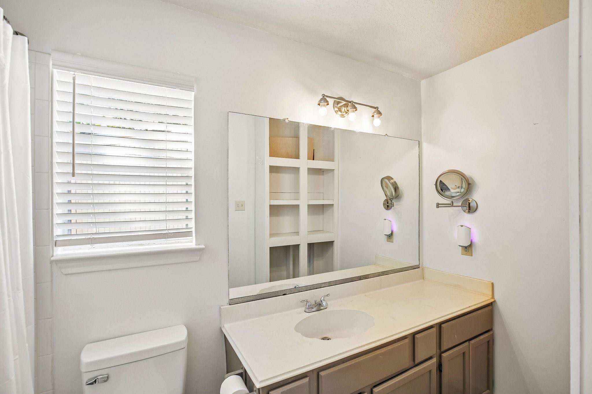 Primary bathroom with plenty of counter space.