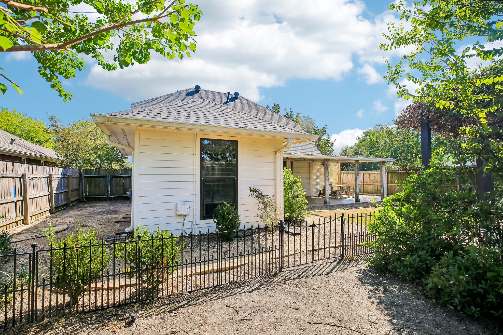 Fenced area for pets or for a vegetable garden.