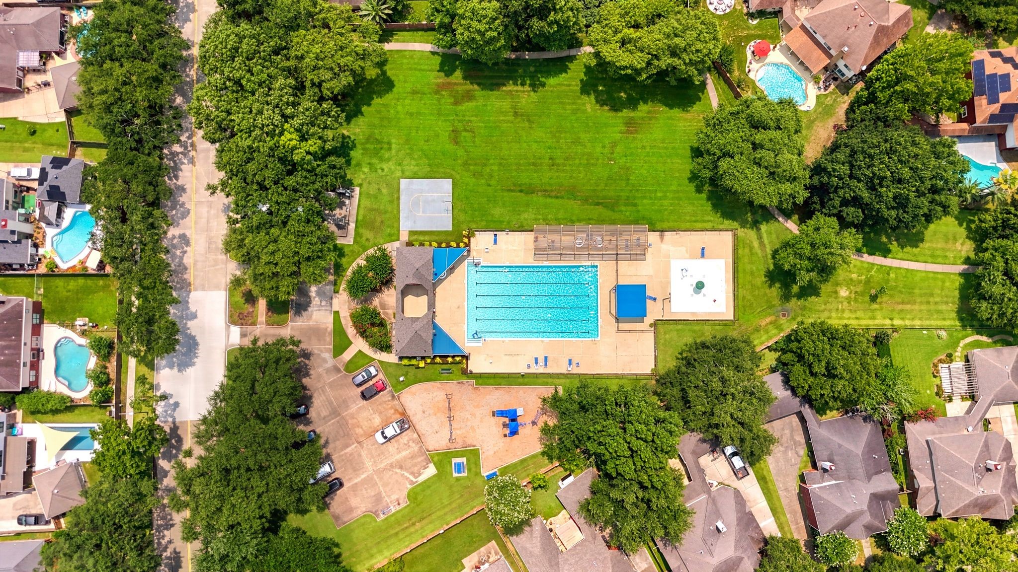 Discover the vibrant heart of a family-friendly community with a stunning community pool and abundant outdoor amenities, perfect for leisure and play.