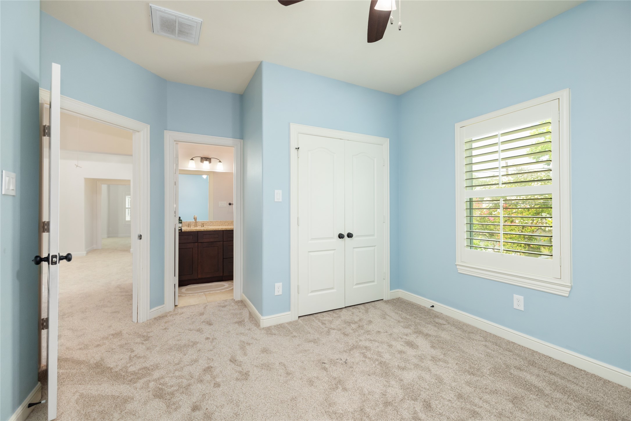 Another upstairs bedroom, this one has its own en suite full bathroom
