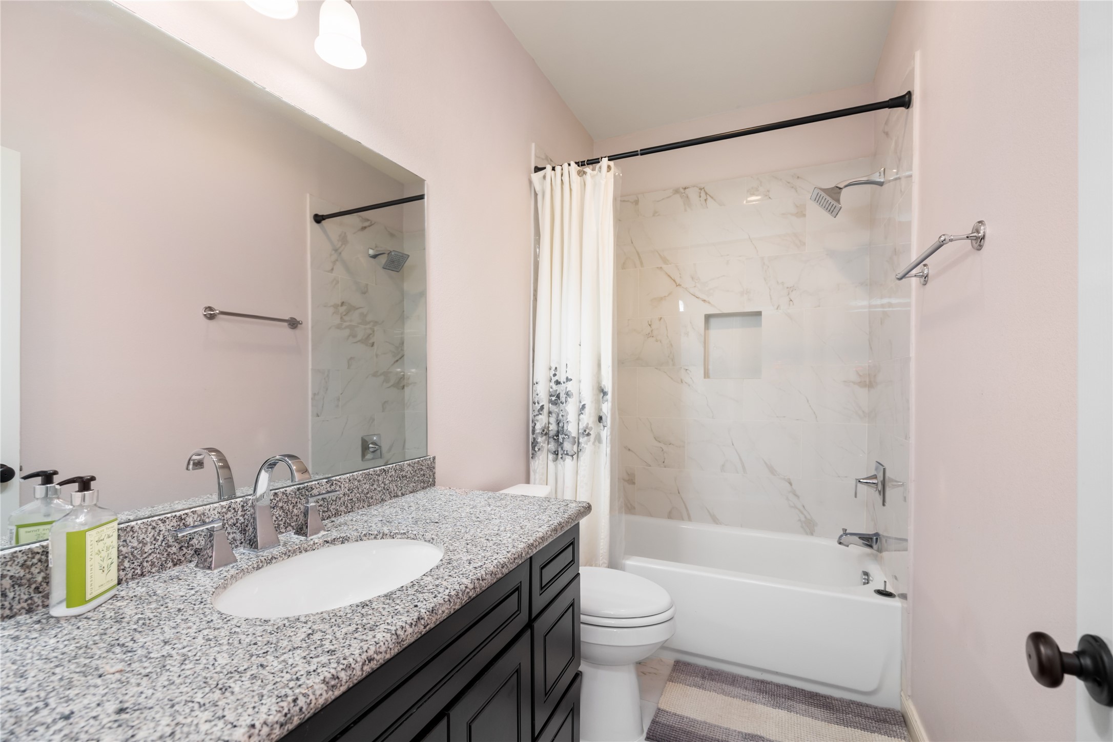 Second full bathroom, hardware has been added to the cabinets since this photo was taken