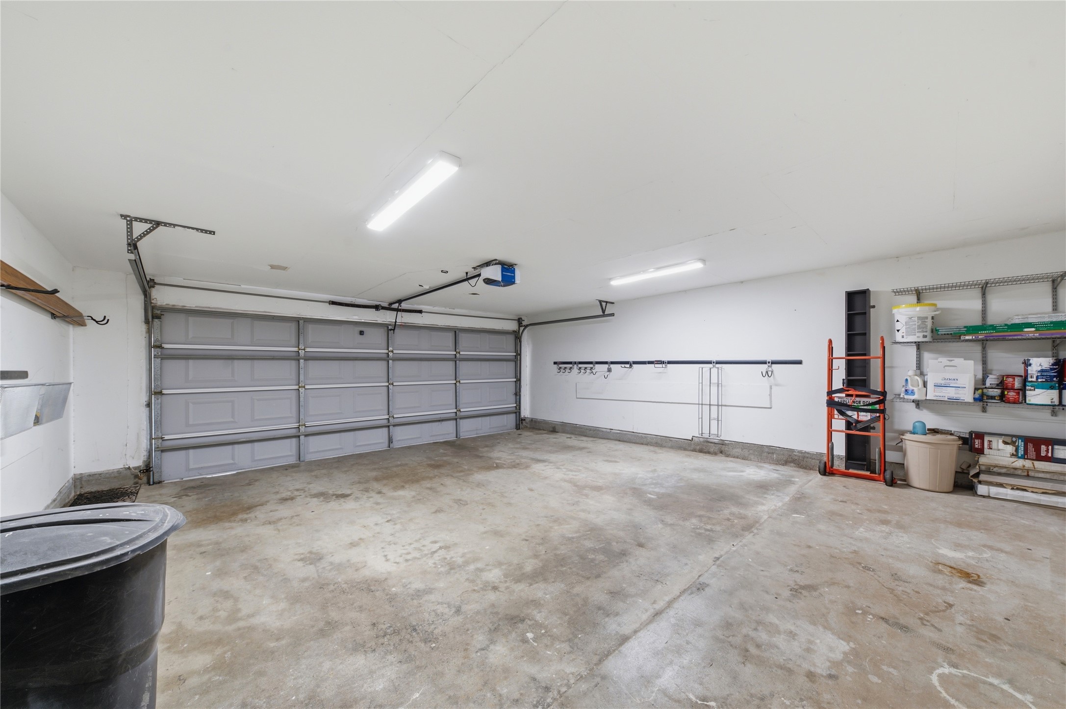 Two-car garage allows for easy parking and storage.