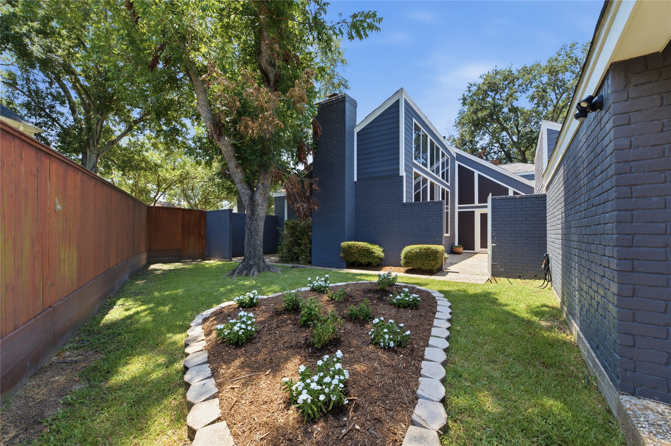 This backyard has it all! Patio, pool and a green space perfect for play or gardening!
